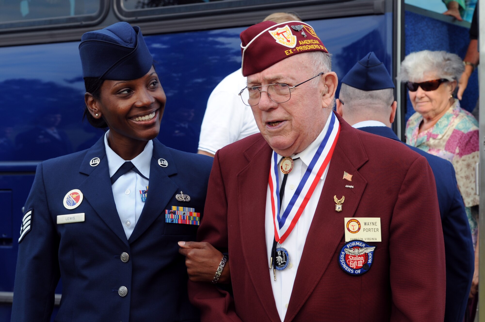 LANGLEY AIR FORCE BASE, Va. – Staff Sgt. Shametra Lewis, 633d Force Support Squadron Airman Leadership School instructor, escorts Wayne Porter, a former prisoner of war, during the POW/MIA Recognition ceremony Sept. 17.  Team Langley honored our nation’s POWs and missing in action through a series of ceremonies and events Sept. 16 and 17, paying respect to those who made, and continue to make, the ultimate sacrifice. (U.S. Air Force photo/Staff Sgt. Tabitha Kuykendall)(RELEASED)