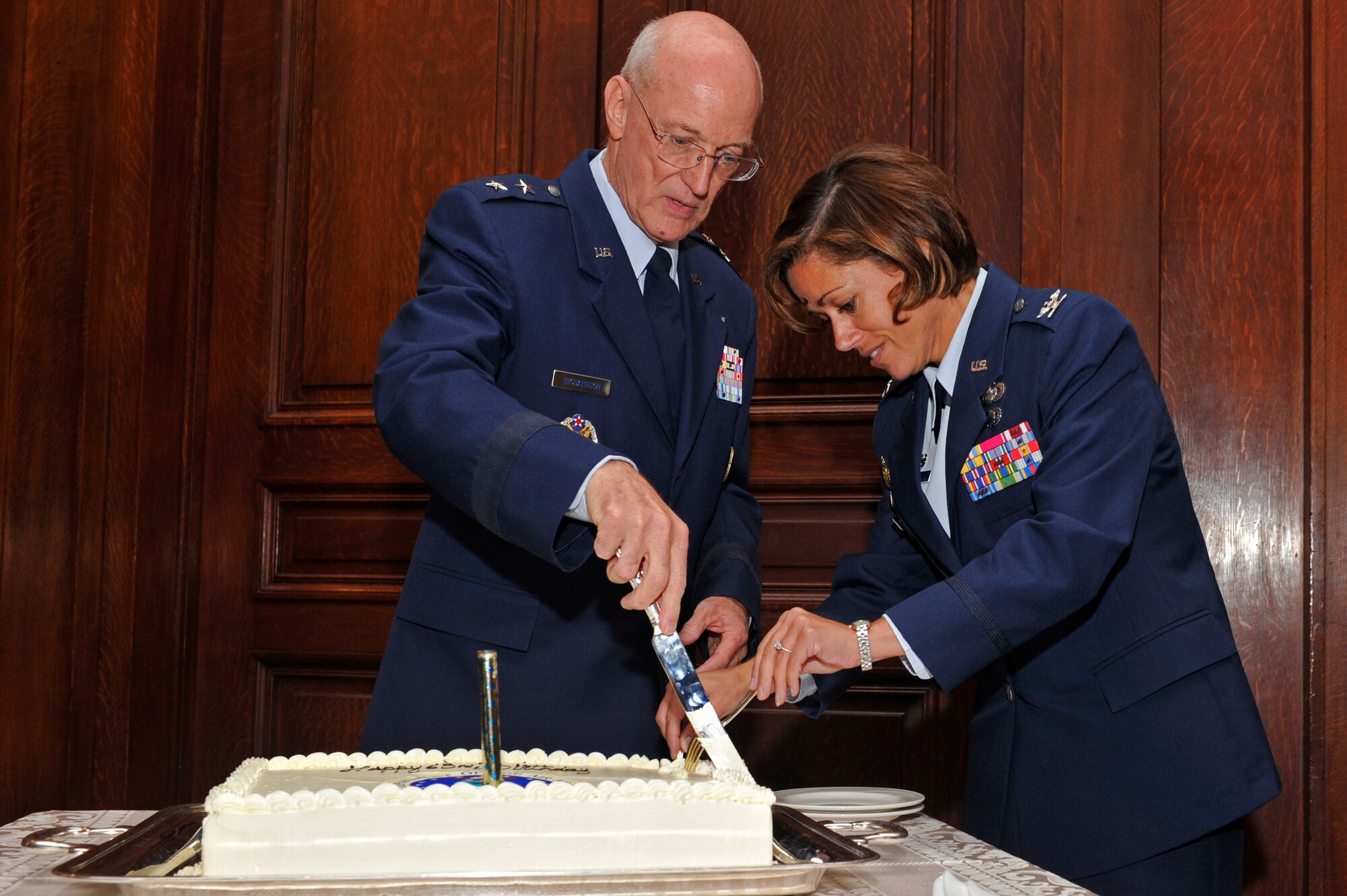 PHILADELPHIA, Penn. -- Chaplain (Maj. Gen.) Cecil R. Richardson, chief of chaplains, headquarters U.S. Air Force and Col. Gina M. Grosso, commander 87th Air Base Wing, Joint Base McGuire-Dix-Lakehurst cut a cake during the 63rd birthday celebration of the U.S Air Force hosted by the Armed Services Council of the Union League of Philadelphia, Sep. 15, 2010. Airmen from Willow Grove Joint Air Reserve Station and Joint Base McGuire-Dix-Lakehurst were in attendance for the celebration where Chaplain Richardson gave the keynote address.  (U.S. Air Force photo by TSgt Laura K. Deckman)(released)