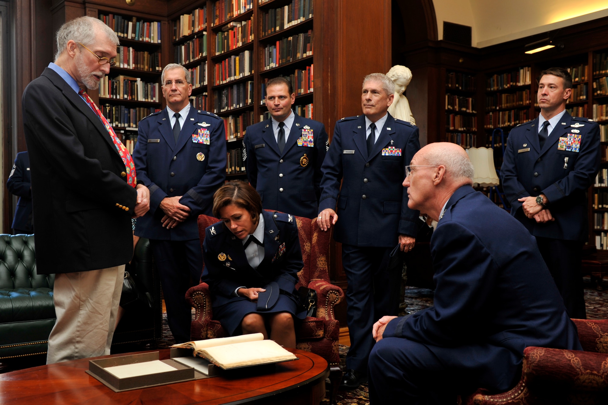 PHILADELPHIA, Penn. -- Mr. David Cassidy, curator for the Union League of Philadelphia, shows historic documents to Air Force servicemembers during a tour of the facility in commemoration of the 63rd birthday of the U.S. Air Force hosted by the Armed Services Council of the Union League of Philadelphia, Sep. 15, 2010. Airmen from Willow Grove Joint Air Reserve Station and Joint Base McGuire-Dix-Lakehurst were in attendance for the celebration where Chaplain (Maj. Gen.) Cecil R. Richardson, chief of chaplains for the U.S. Air Force, gave the keynote address.  (U.S. Air Force photo by TSgt Laura K. Deckman)(released)