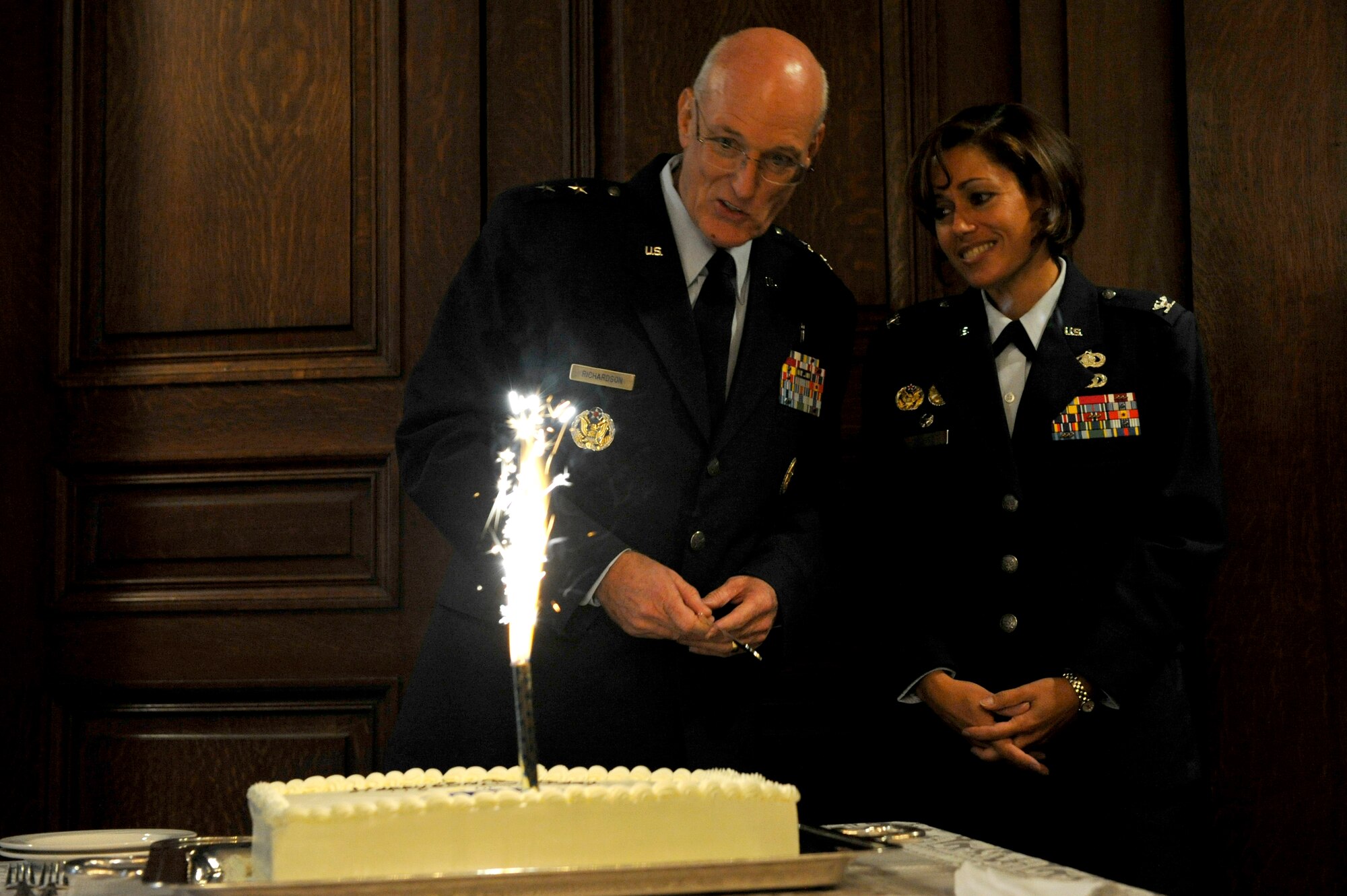 PHILADELPHIA, Penn. -- Chaplain (Maj. Gen.) Cecil R. Richardson, chief of chaplains, Headquarters U.S. Air Force and Col. Gina M. Grosso, commander 87th Air Base Wing, Joint Base McGuire-Dix-Lakehurst prepare to cut a cake during the 63rd birthday celebration of the U.S Air Force hosted by the Armed Services Council of the Union League of Philadelphia, Sep. 15, 2010. Airmen from Willow Grove Joint Air Reserve Station and Joint Base McGuire-Dix-Lakehurst were in attendance for the celebration where Chaplain. Richardson delivered the keynote address.  (U.S. Air Force photo by TSgt Laura K. Deckman)(released)