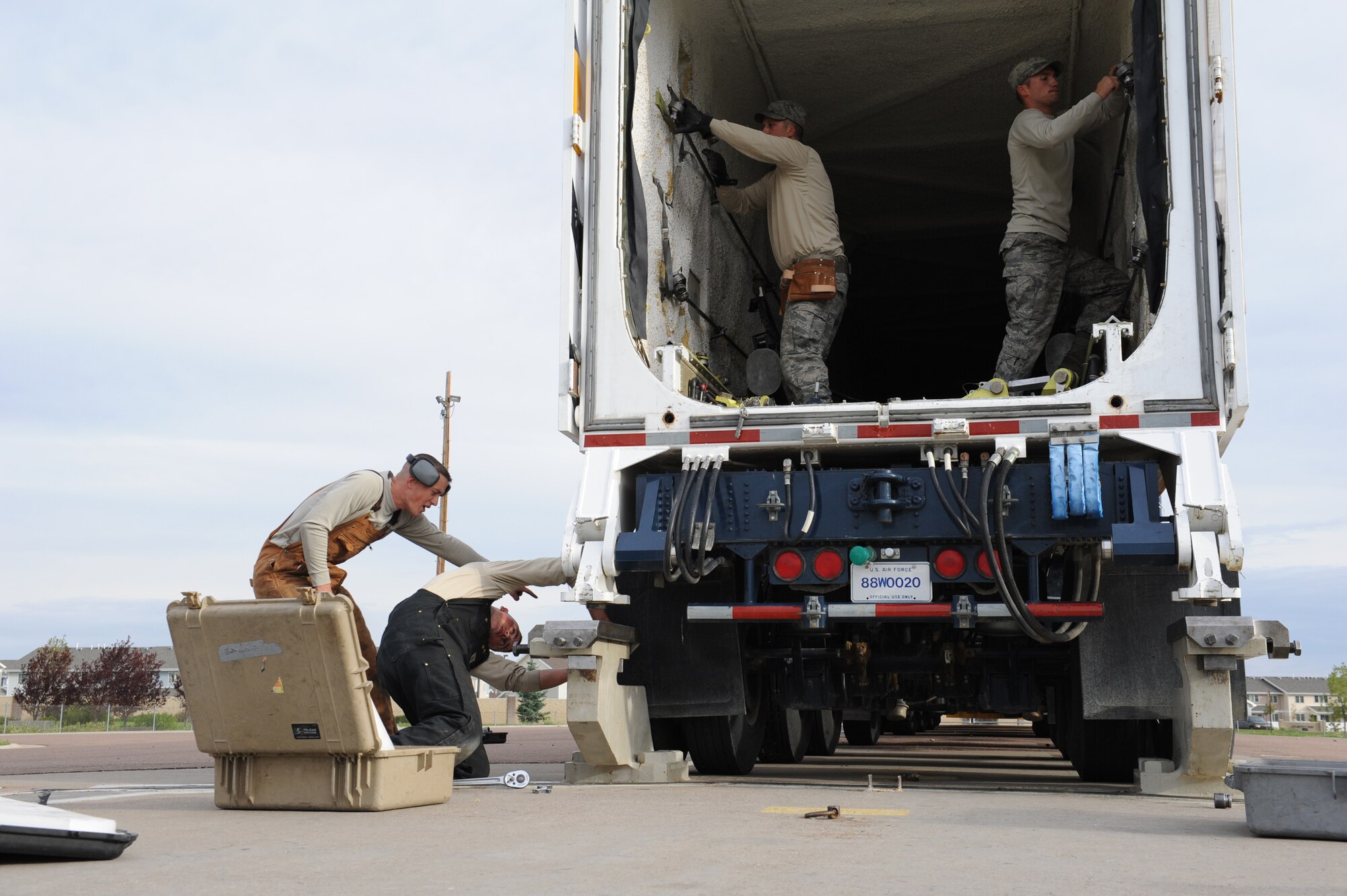 The Global Strike Challenge Missile Handling Team drills on aligning, securing and preparing the payload transporter at the T-9 training facility. (U.S. Air Force photo/John Turner)