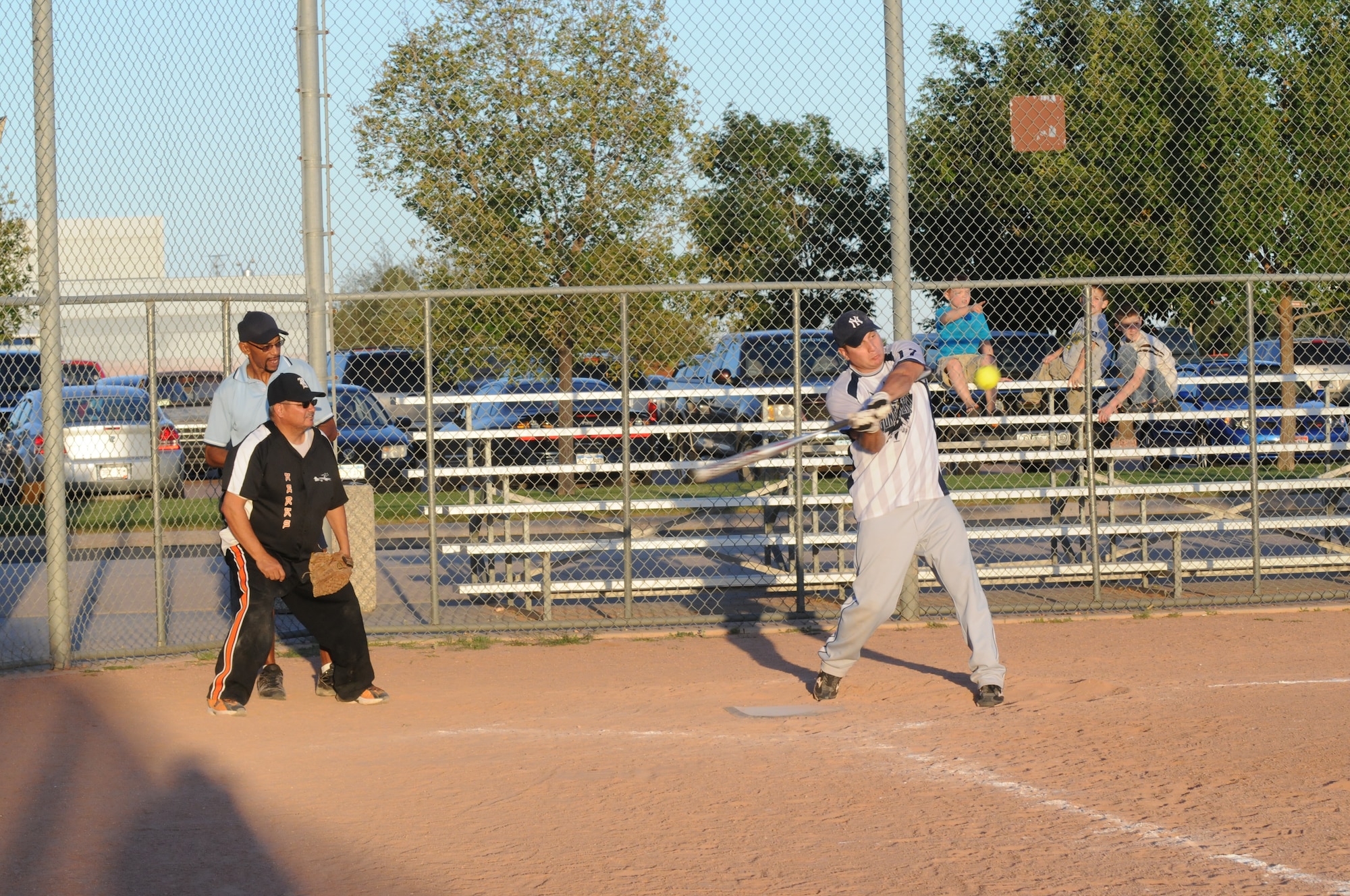 A 13th Air Support Operations Squadron player blasts a base hit to center during the silver league championship game Aug. 31 at the Peterson Sports Complex. The 302nd Airlift Wing/52nd Airlift Squadron team defeated 13th ASOS 20-10 to earn the 2010 silver league title. (U.S. Air Force photo/Walt Johnson)