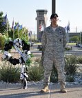 LAUGHLIN AIR FORCE BASE, Texas – Maj. Ian Dinesen, 47th Security Forces Squadron commander, stands guard over a POW/MIA remembrance wreath at Laughlin’s Heritage Park Sept. 17. The vigil was part of Laughlin’s POW/MIA Recognition Day activities, which also included a roundtable discussion with a former prisoner of war and three other Vietnam veterans who were shot down in action as well as a retreat ceremony. (U.S. Air Force photo by Airman 1st Class Blake Mize)