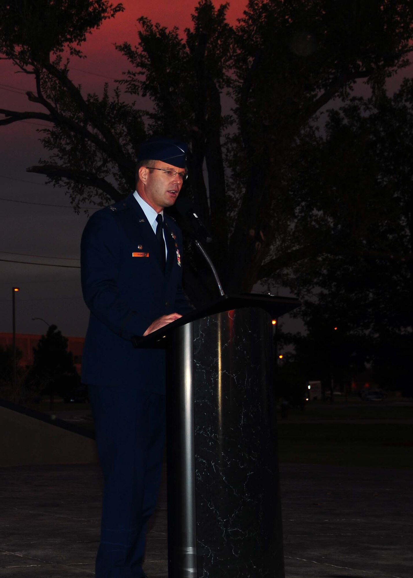 ALTUS AIR FORCE BASE, Okla.--Col. Ty Thomas, commander of the 97th Air Mobility Wing, speaks to the Airmen of the Mighty 97 during the Prisoners of War/Missing in Action ceremony Sept. 17. The POW/MIA ceremony is held annually to remember those who have sacrificed their lives for their country. (U.S. Air Force photo/Senior Airman Leandra D. Hernandez)