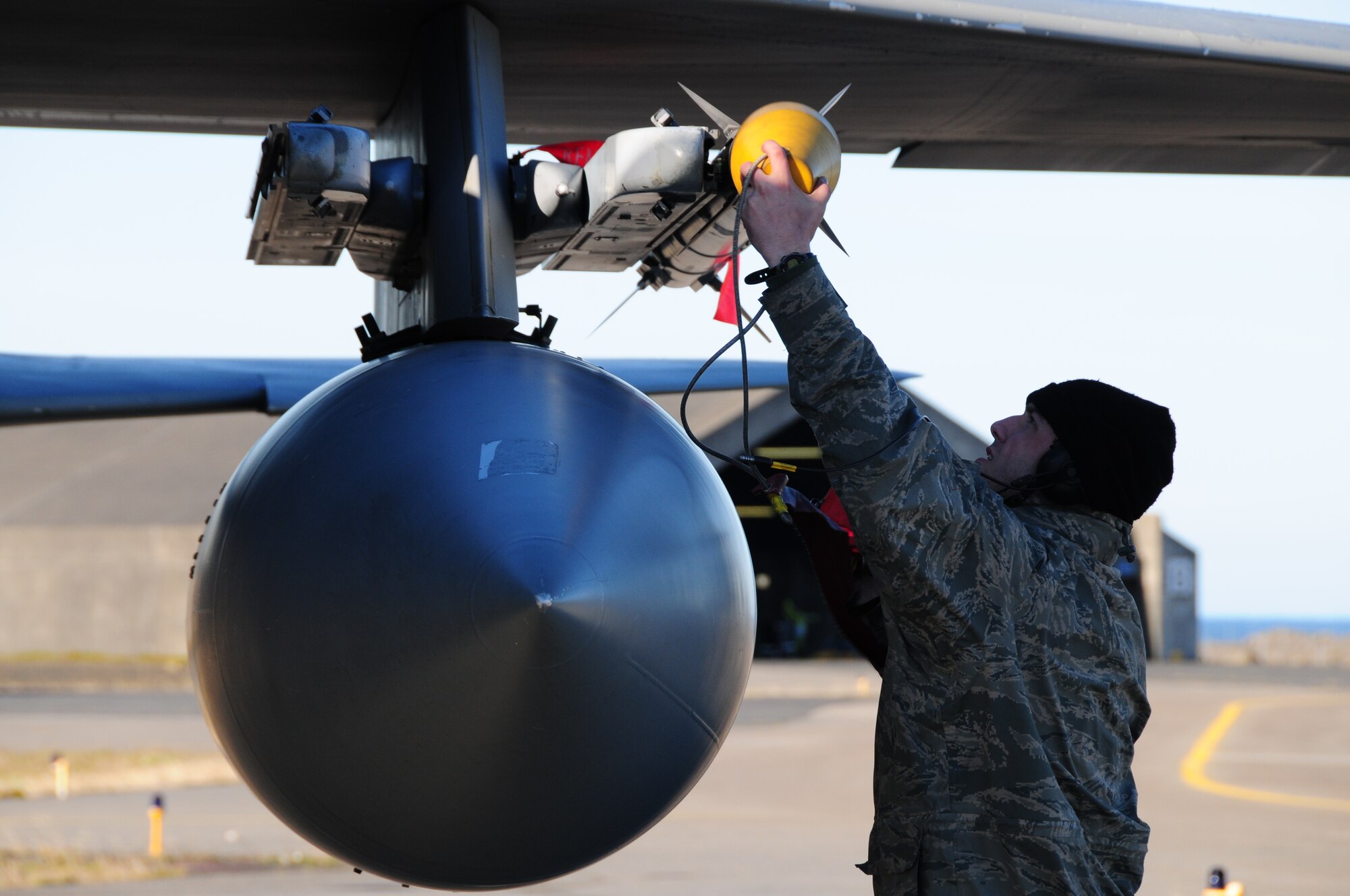 KEFLAVIK, Iceland – Airman 1st Class Thomas Trimeloni, 493rd Expeditionary Fighter Squadron, puts a cover on an AIM-9X missile Sept. 16, 2010. Airman Trimeloni is deployed from the 493rd Aircraft Maintenance Squadron at RAF Lakenheath, England, in support of the Icelandic Air Policing mission.  The IAP is conducted as part of NATO's mission of providing air sovereignty for member nations and has also been conducted by France, Denmark, Spain and Poland. (U.S. Air Force photo/Senior Airman Stephen Linch)