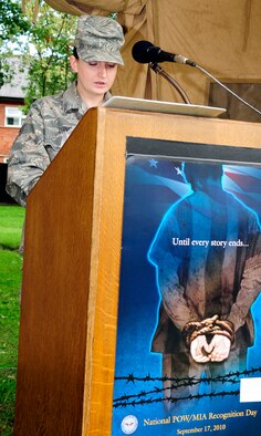 RAF MILDENHALL, England -- Staff Sgt. Melisa Long, 352nd Special Operations Group, reads names from the Prisoner of War/Missing in Action list during the 24-Hour Vigil here Sept. 16. Volunteers read names before standing guard in front of the memorial. (U.S. Air Force photo/Senior Airman Ethan Morgan)