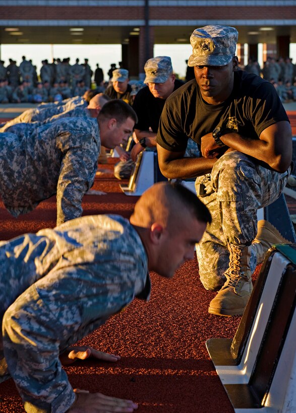 U.S. Army soldiers are given three minutes to do as many push-ups as they can before sprinting to the pull-up bars during day one of the 14th Annual Warfighter Challenge on Fort Leonard Wood, Mo., Sept. 13, 2010.