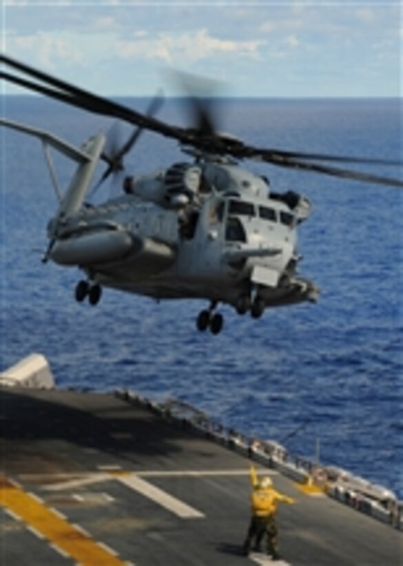 A CH-53E Sea Stallion helicopter assigned to Marine Medium Helicopter Squadron 262 takes off from the flight deck of the forward-deployed amphibious assault ship USS Essex (LHD 2) underway in the Philippine Sea participating in joint service exercise Valiant Shield on Sept. 14, 2010.  