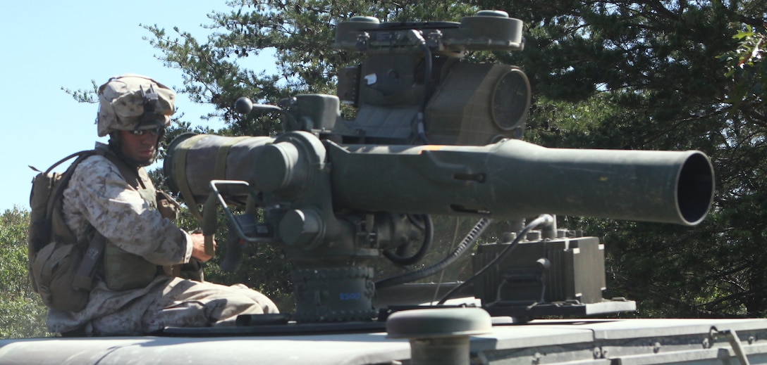 Cpl. Ryan M. Skibenez, a team leader with Weapons Company, 2nd Battalion, 8th Marine Regiment sits atop a humvee, waiting to approach the firing line to fire his first TOW missile during a training exercise, here, recently.  The Newark, N.J. native has been an anti-tank guided missile man for three and a half years.