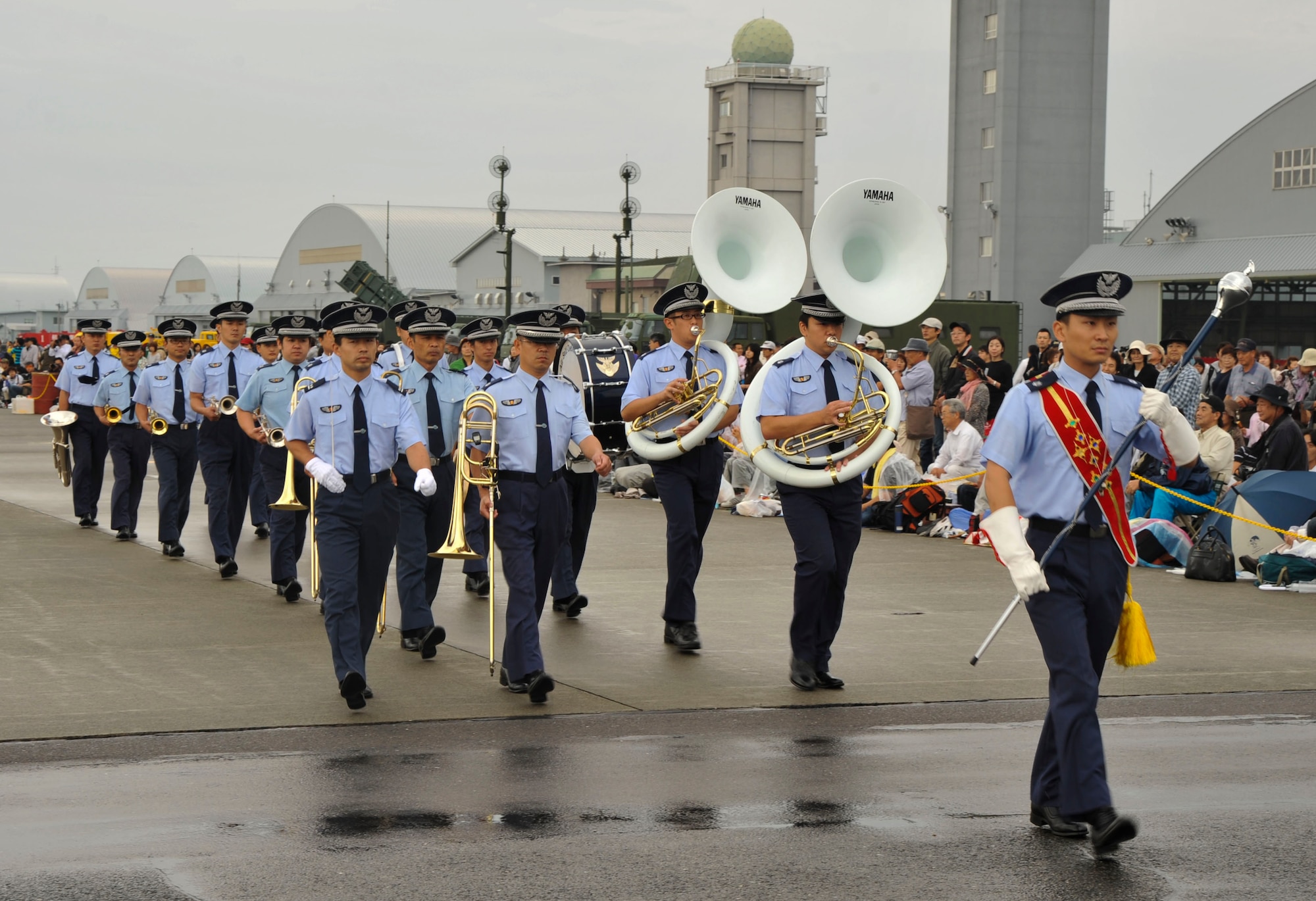 The Japan Air Self-Defense Force band performs during opening ceremonies at the Misawa Air Festival at Misawa Air Base, Japan, Sept. 19, 2010. People from all over Japan visited the base to view demonstration flights by Blue Impulse Demonstration Team, JASDF F-2, U.S. Air Force F-16s and A-10s, among others.  (U.S. Air Force Photo/Tech. Sgt. Russell McBride) (Released)