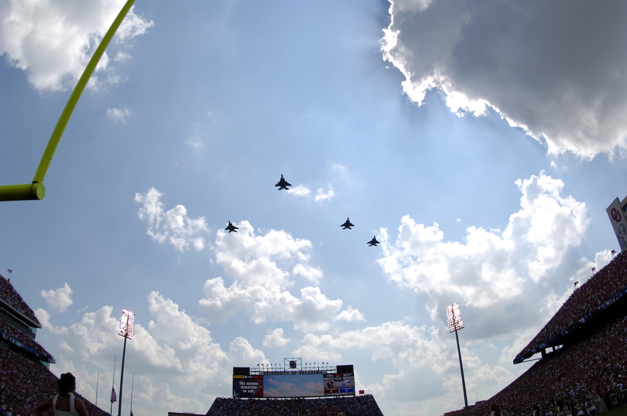 Four F-15s from Mountain Home Air Force Base, Idaho, fly over Oklahoma University's Owen Field in Norman, Okla., before the Air Force Academy took on the Sooners Saturday, Sept. 18, 2010.  The Falcons came back from a 17-point deficit, but fell short by three with a final of 27-24.  (U.S. Air Force photo/Staff Sgt. Raymond Hoy)