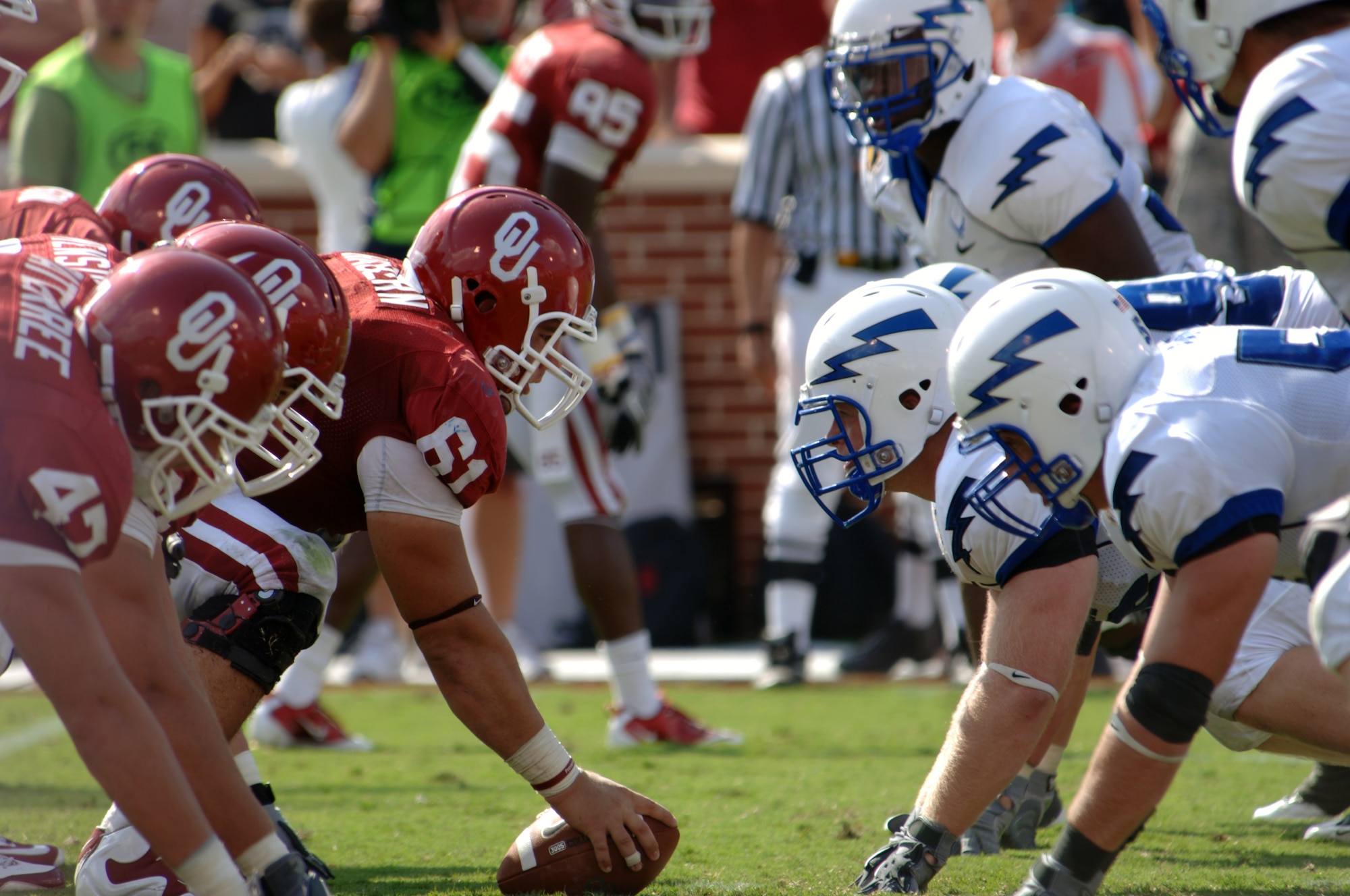 The Falcons' defensive line squares off against the Oklahoma Sooners Saturday, Sept. 18, 2010 at Oklahoma University's Memorial Stadium in Norman, Okla.  The defense gave up 367 offensive yards to the Sooners on the day.  The Falcons came back from a 17-point deficit, but fell short by three with a final of 27-24.  (U.S. Air Force photo/Staff Sgt. Raymond Hoy)