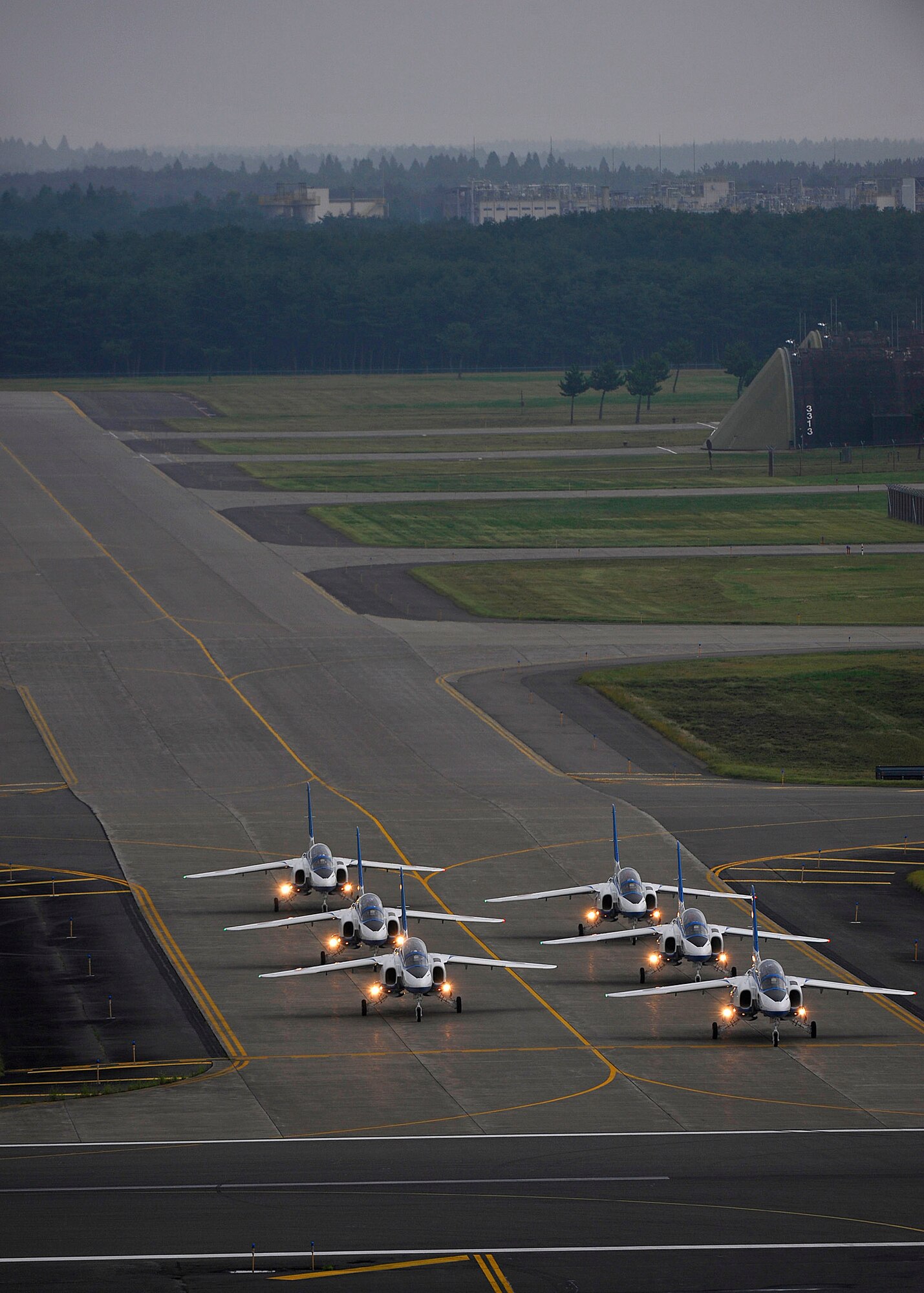 Japanese demonstration team, Blue Impulse, taxis to the runway prior to its demonstration during Misawa Air Festival 2010 Sept. 19, at Misawa Air Base, Japan. (U.S. Air Force photo by Staff Sgt. Chad Strohmeyer/Released)