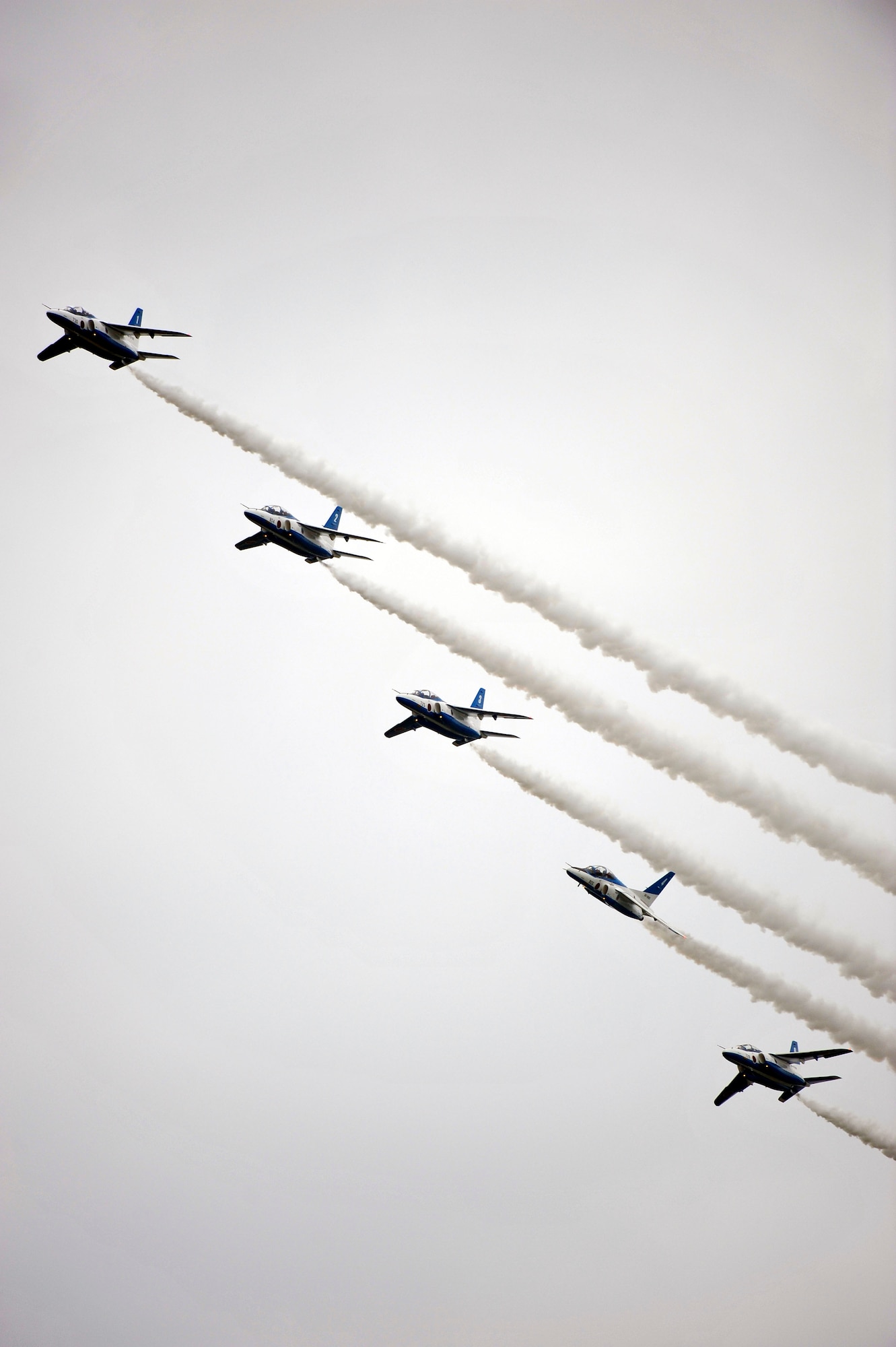 Japanese demonstration team, Blue Impulse, performs a five-ship formation flyby during Misawa Air Festival 2010 Sept. 19, at Misawa Air Base, Japan. (U.S. Air Force photo by Staff Sgt. Chad Strohmeyer/Released)