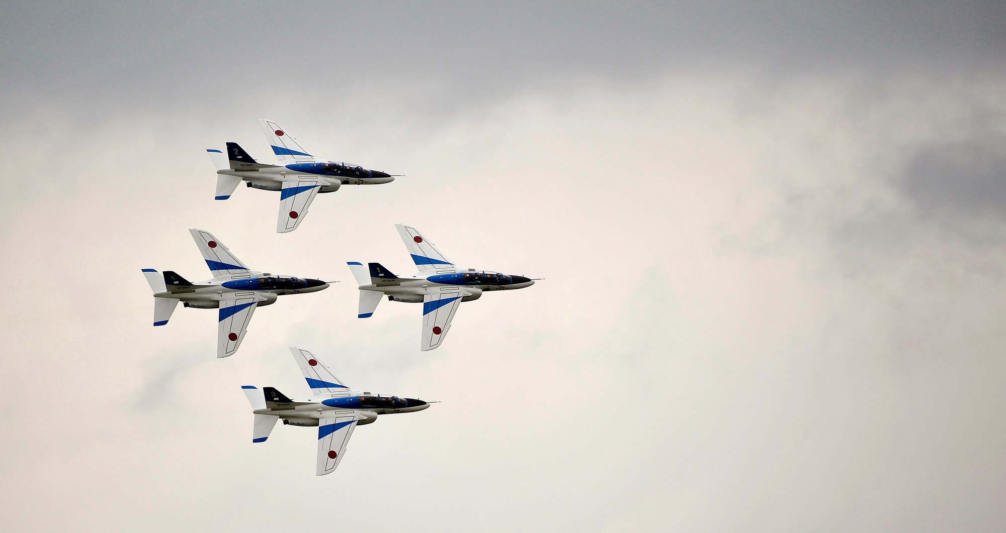 Japanese demonstration team, Blue Impulse, performs a four-ship formation flyby during Misawa Air Festival 2010 Sept. 19, at Misawa Air Base, Japan. (U.S. Air Force photo by Staff Sgt. Chad Strohmeyer/Released)