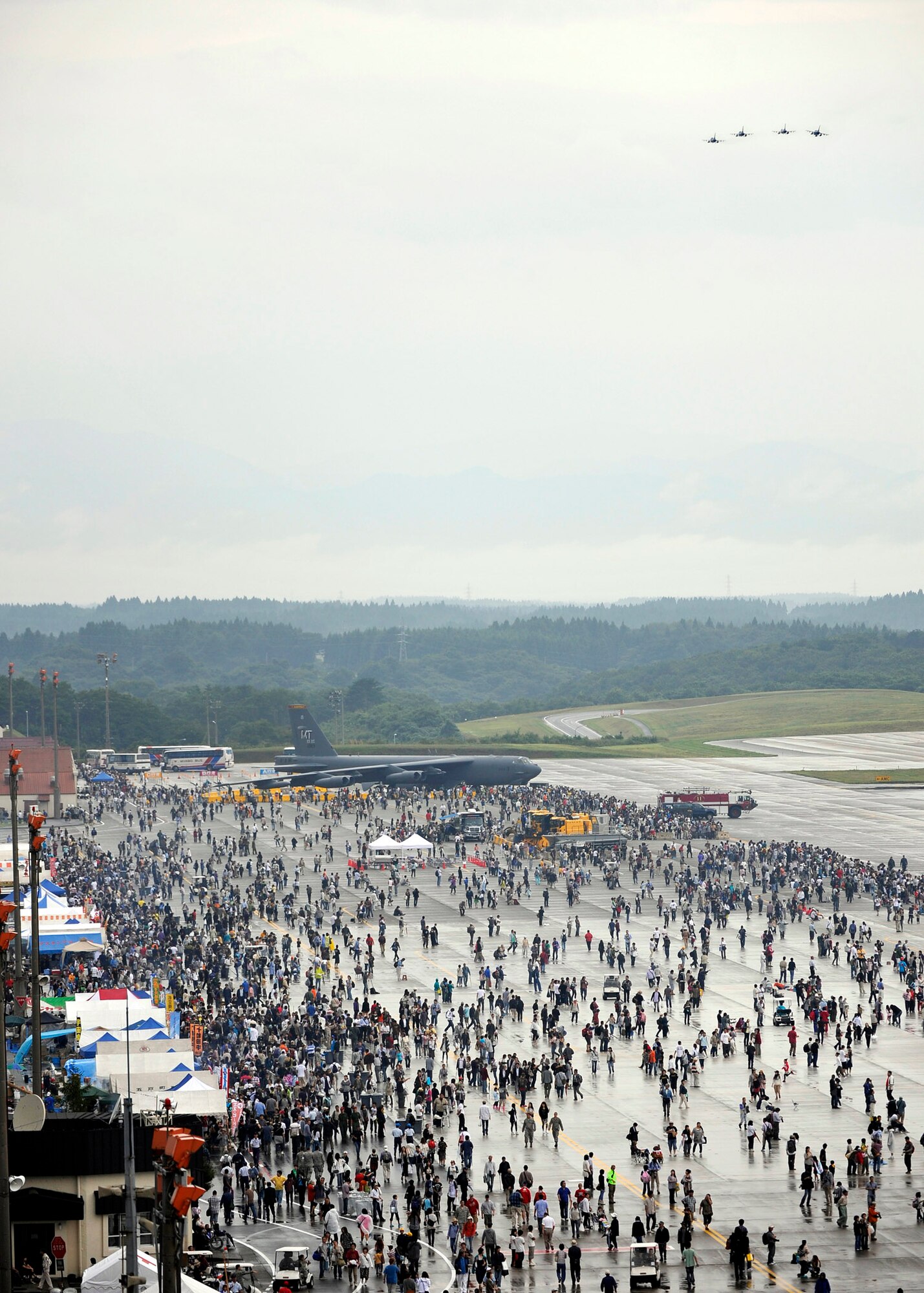 Japanese F-2s fly over the runway during Misawa Air Festival 2010 Sept. 19, at Misawa Air Base, Japan. (U.S. Air Force photo by Staff Sgt. Chad Strohmeyer/Released)
