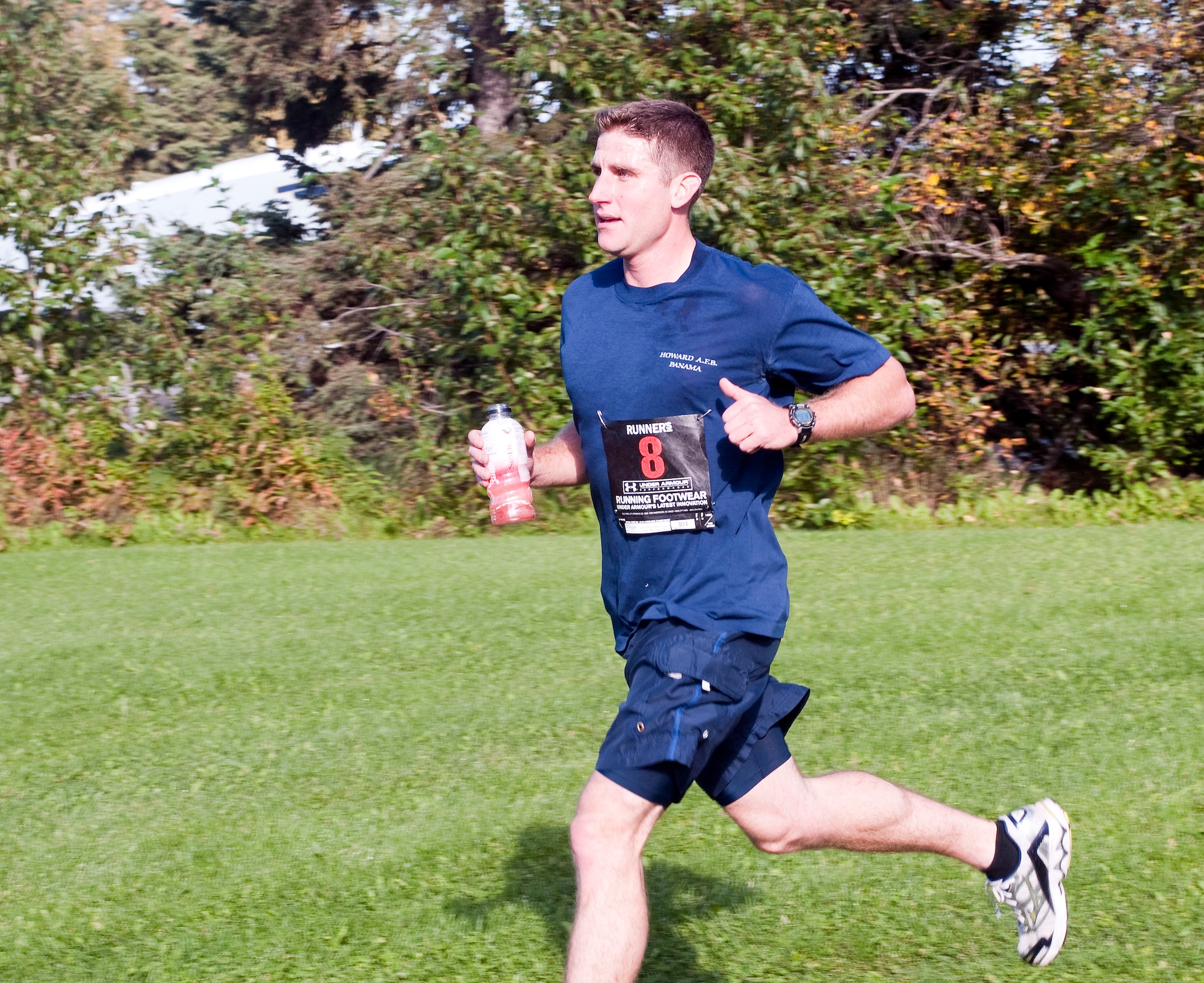 KULIS AIR NATIONAL GUARD BASE, Alaska -- 1st Lt. Gary Weir, a pilot with the 144th Airlift Squadron, cruises toward the finish line of the first-ever 176th Wing Duathlon, held here Sept. 18, 2010. Weir was the race's top overall finisher, with a time of 38:39. The Kulis Senior Enlisted Association sponsored the event. AKANG photo by 1st. Lt. John Callahan.