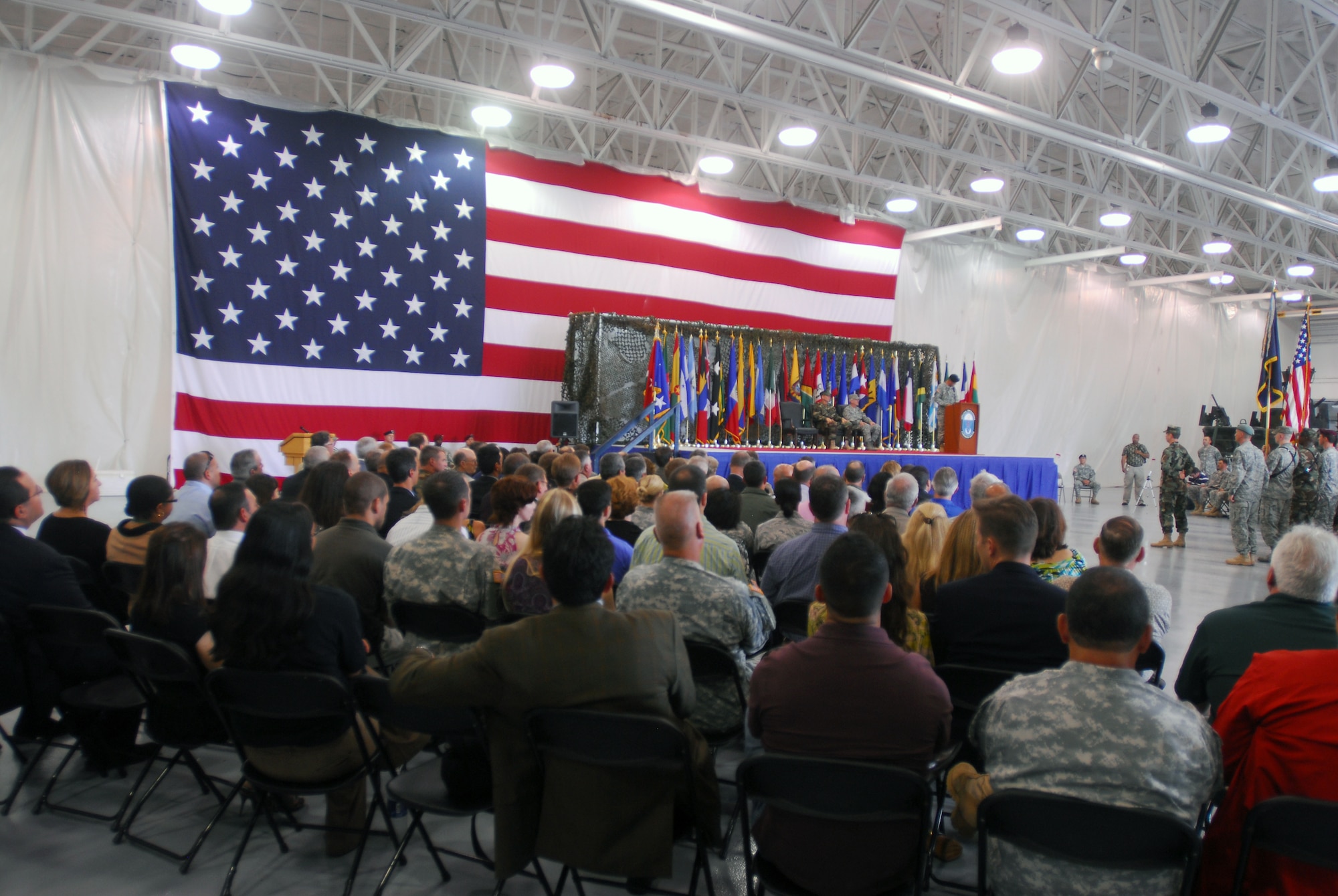 Hundreds of service members and civilians listen to Army Brig. Gen. Hector E. Pagan after relinquishing command of Special Operations Command South on Sept. 17 at Homestead Air Reserve Base, Fla. Pagan thanked the service members of the command for their hard work and dedication during his time as the SOCSOUTH commander. Pagan is also retiring from the military after more than 30 years of service. (U.S. Army Photo/Sgt. 1st Class Alex Licea, SOCSOUTH Public Affairs)
