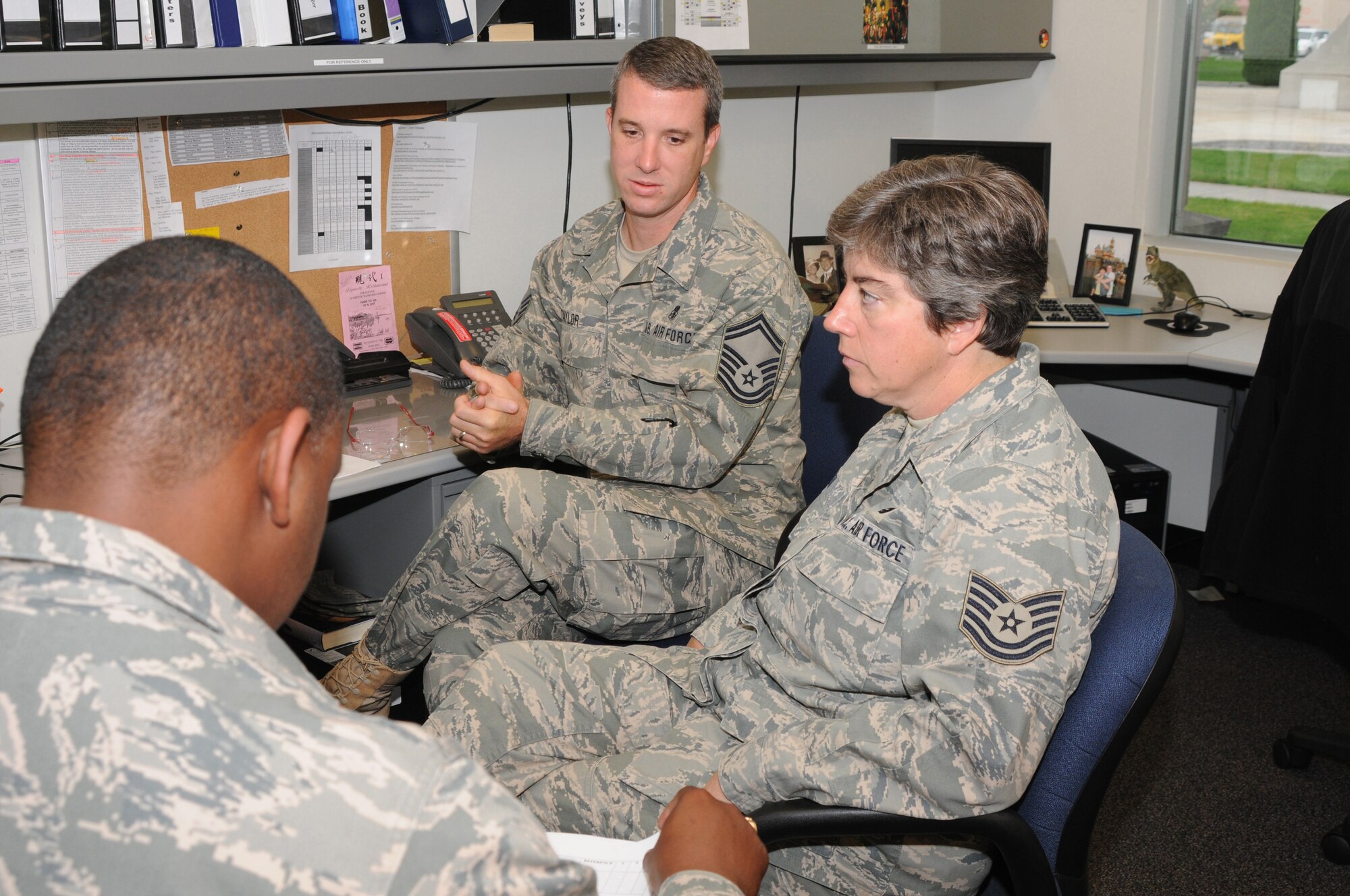 Senior Master Sergeant Jerod Taylor and Tech Sergeant Cody Yeager, airmen in the 173rd Medical Group, review inspection results with a member of the Unit Compliance Inspection team at Kingsley Field, Ore., September 18, 2010.  Kingsley Field has been under the microscope by the UCI team this week to ensure the base is performing up to Air Force standards.  (U.S. Air Force photo by Senior Airman Bryan Nealy.) Released