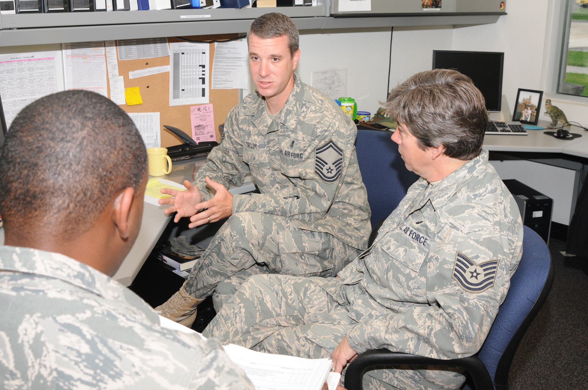 Senior Master Sergeant Jerod Taylor and Tech Sergeant Cody Yeager, airmen in the 173d Medical Group, review inspection results with a member of the Unit Compliance Inspection team at Kingsley Field, Ore., September 18, 2010.  Kingsley Field has been under the microscope by the UCI team this week to ensure the base is performing up to Air Force standards.  (U.S. Air Force photo by Senior Airman Bryan Nealy.) Released