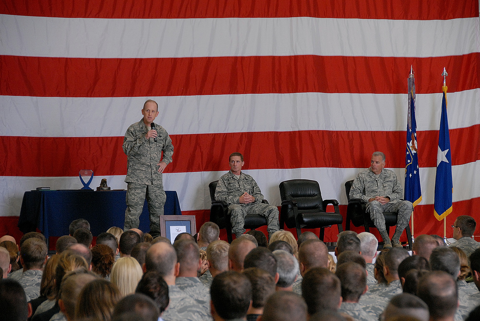 Brigadier General Donald Dunbar, Wisconsin National Guard adjutant general, addresses more than 350 members of the 115th Fighter Wing at the unit's first-ever Hometown Heroes Salute ceremony.  The National Guard program honors recognizes Airmen who deployed for more than 30 consecutive days for Operations Noble Eagle, Enduring Freedom and Iraqi Freedom and all other contingency operations.  Airman's families and centers of influence were also recognized. (U.S. Air Force photo by Tech. Sgt. Ashley Bell)
