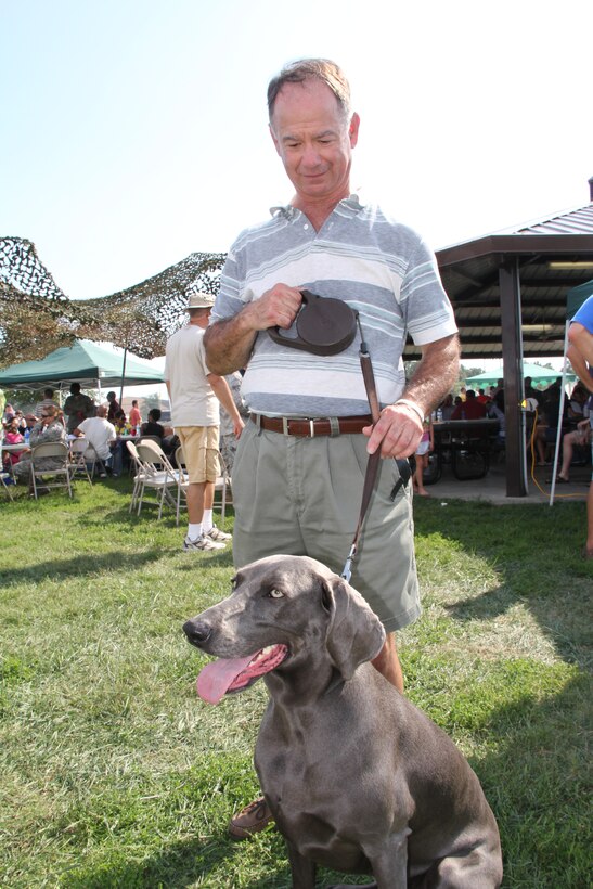 Lt. Col. Don Weimer shows off, Elke, a pure bred blue Weimaraner, at the annual 932nd Airlift Wing Picnic.  Hundreds of reservists and their family members attended the event. (U.S. Air Force photo/Tech. Sgt. Dan Oliver)