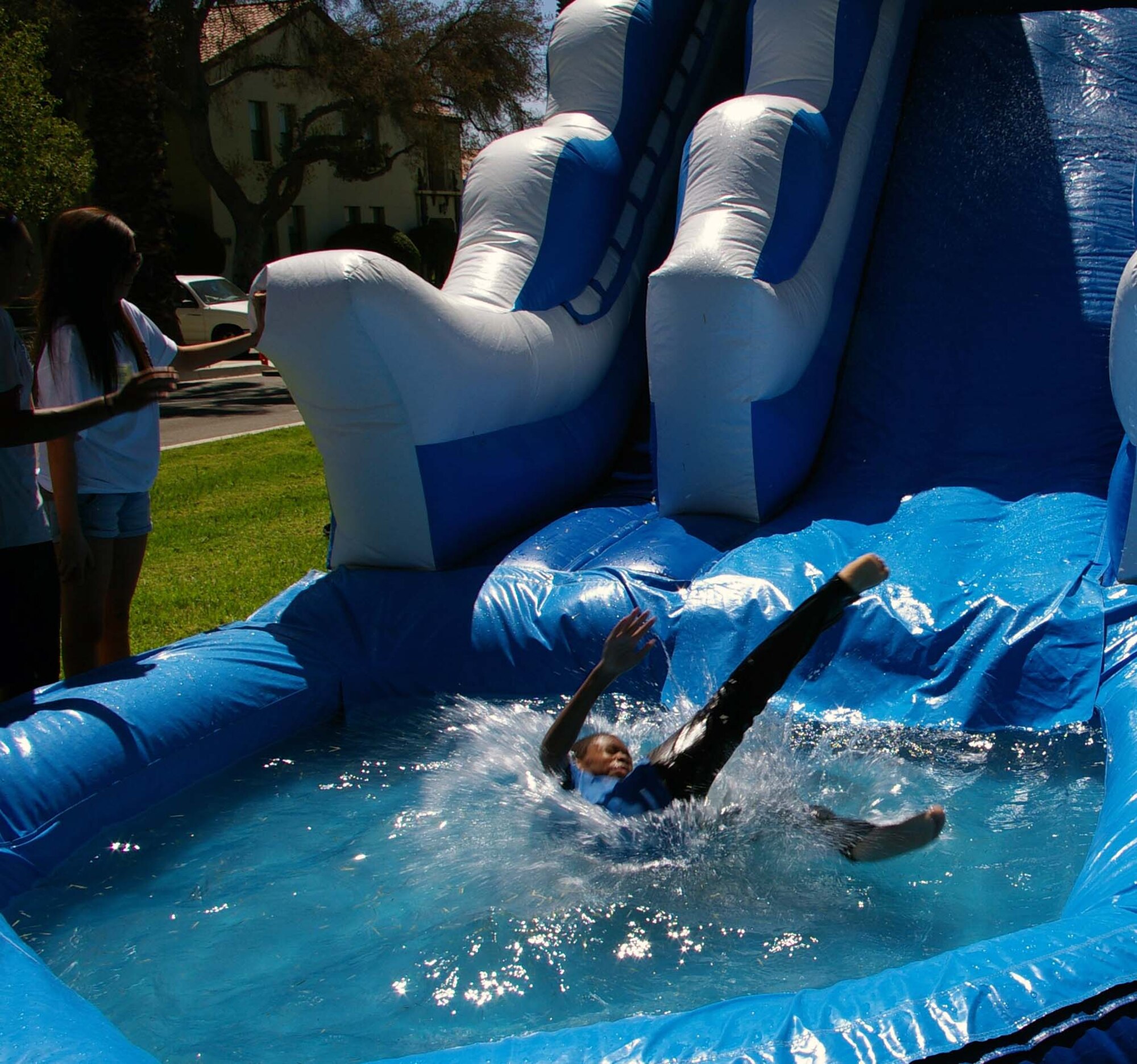 Children enjoy the water slide during the 39th Annual March Air Reserve Base Military Appreciation Picnic, Sept. 18, 2010.  (U.S. Air Force photo by 2nd. Lt. Zach Anderson)