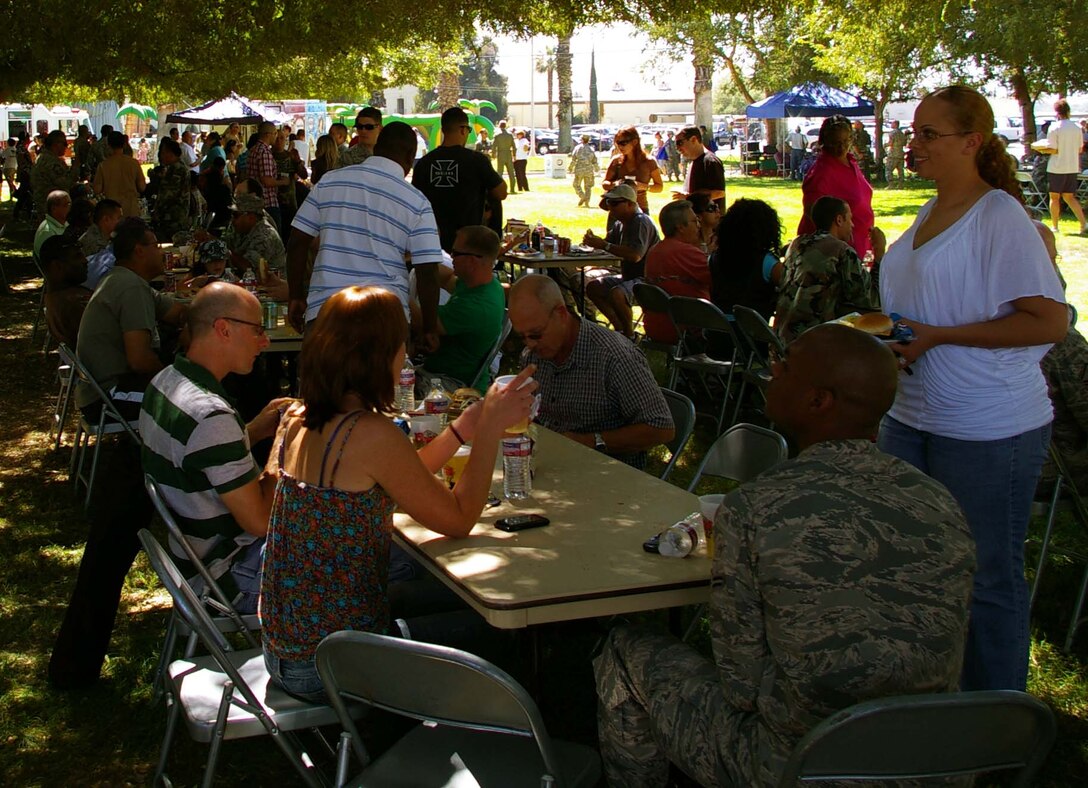 Memebrs of Team March enjoy a feast during the 39th Annual March Air Reserve Base Military Appreciation Picnic, Sept. 18, 2010.  (U.S. Air Force photo by 2nd Lt. Zach Anderson)