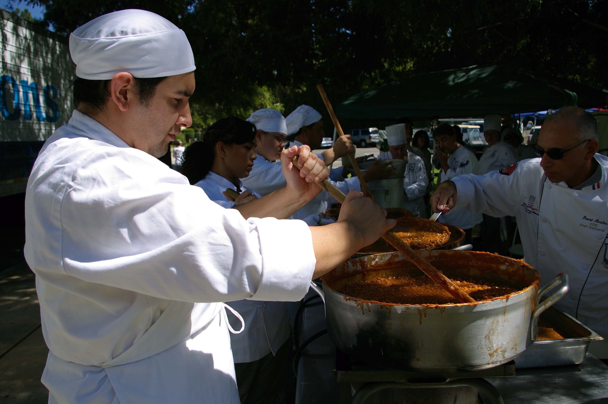 Andre Guerrero of the Riverside City College Culinary Academy, stirs a pot of beans for the 39th Annual March Air Reserve Base Military Appreciation Picnic, Sept. 18, 2010.  (U.S. Air Force photo by 2nd Lt. Zach Anderson)