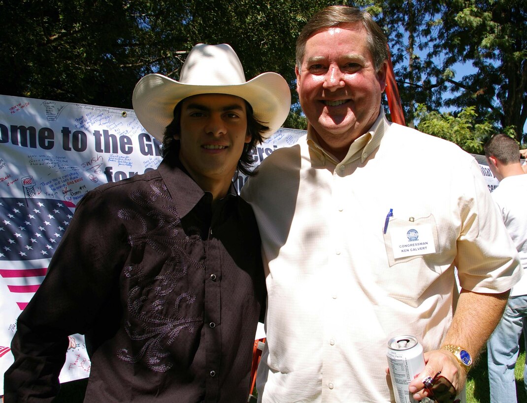 Country music performer Buck Ford and U.S. Congressman Ken Calvert enjoy the 39th Annual March Air Reserve Base Military Appreciation Picnic, Sept. 18, 2010.  (U.S. Air Force photo by 2nd Lt. Zach Anderson)
