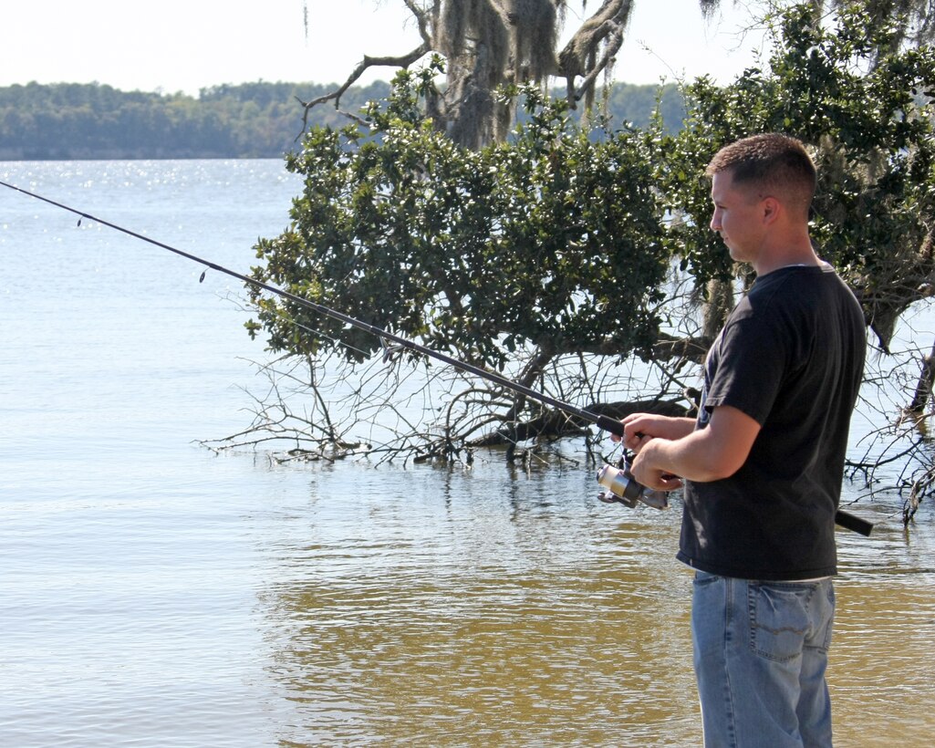 Corporal Justin T. Norton, a data network specialist with the 22nd Marine Expeditionary Unit and Delta, Colo., native, fishes during the 22nd MEU family day held at the Hospital Point Recreation Area aboard Camp Lejeune, N.C., Sept. 19, 2010. The MEU hosted the family day to build camaraderie between the Marines and sailors and their families.