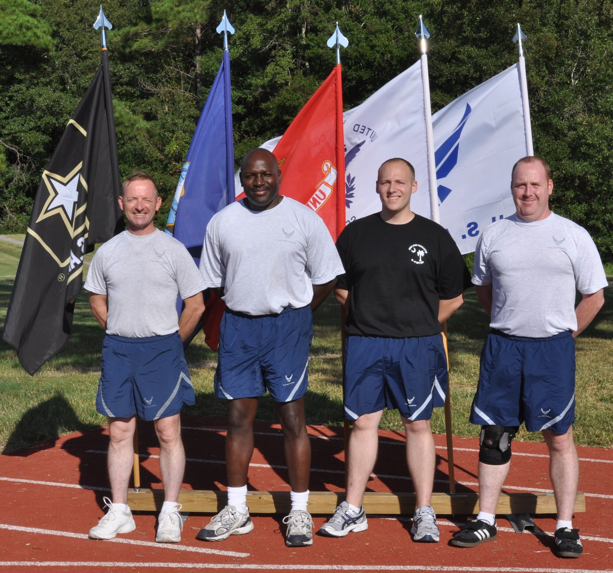 Members of the 315th Security Forces Squadron prepare to participate in the 4th annual Charleston Air Force Base POW/MIA 24-hour vigil run Sept. 16, 2010 at the base running track. (U.S. Air Force Photo/Staff Sgt. Shane Ellis)