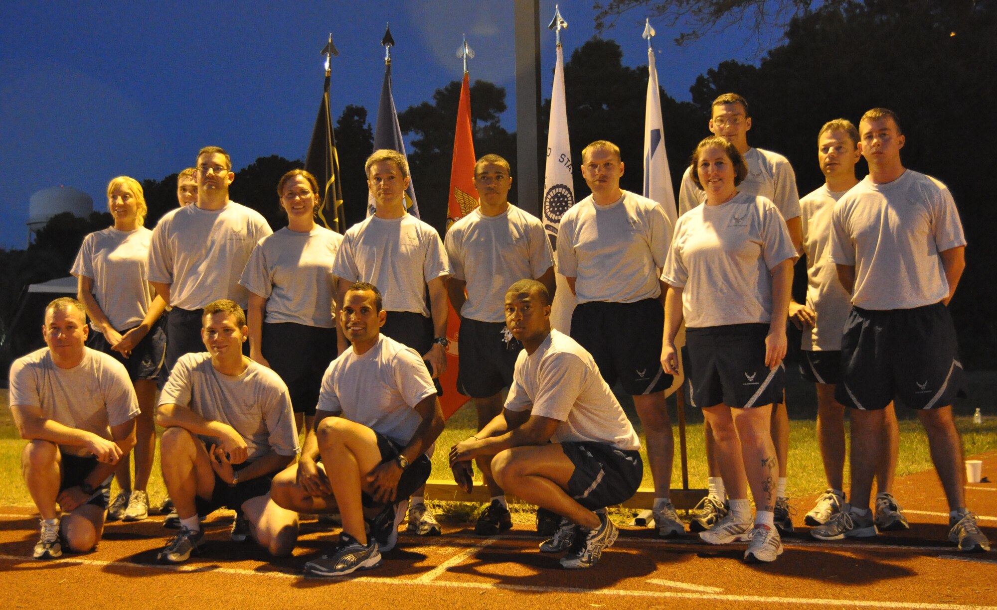 Members of the 315th Aircraft Maintenance Squadron prepare to participate in the 4th annual Charleston Air Force Base POW/MIA 24-hour vigil run Sept. 16, 2010 at the base running track. (U.S. Air Force Photo/Staff Sgt. Shane Ellis)