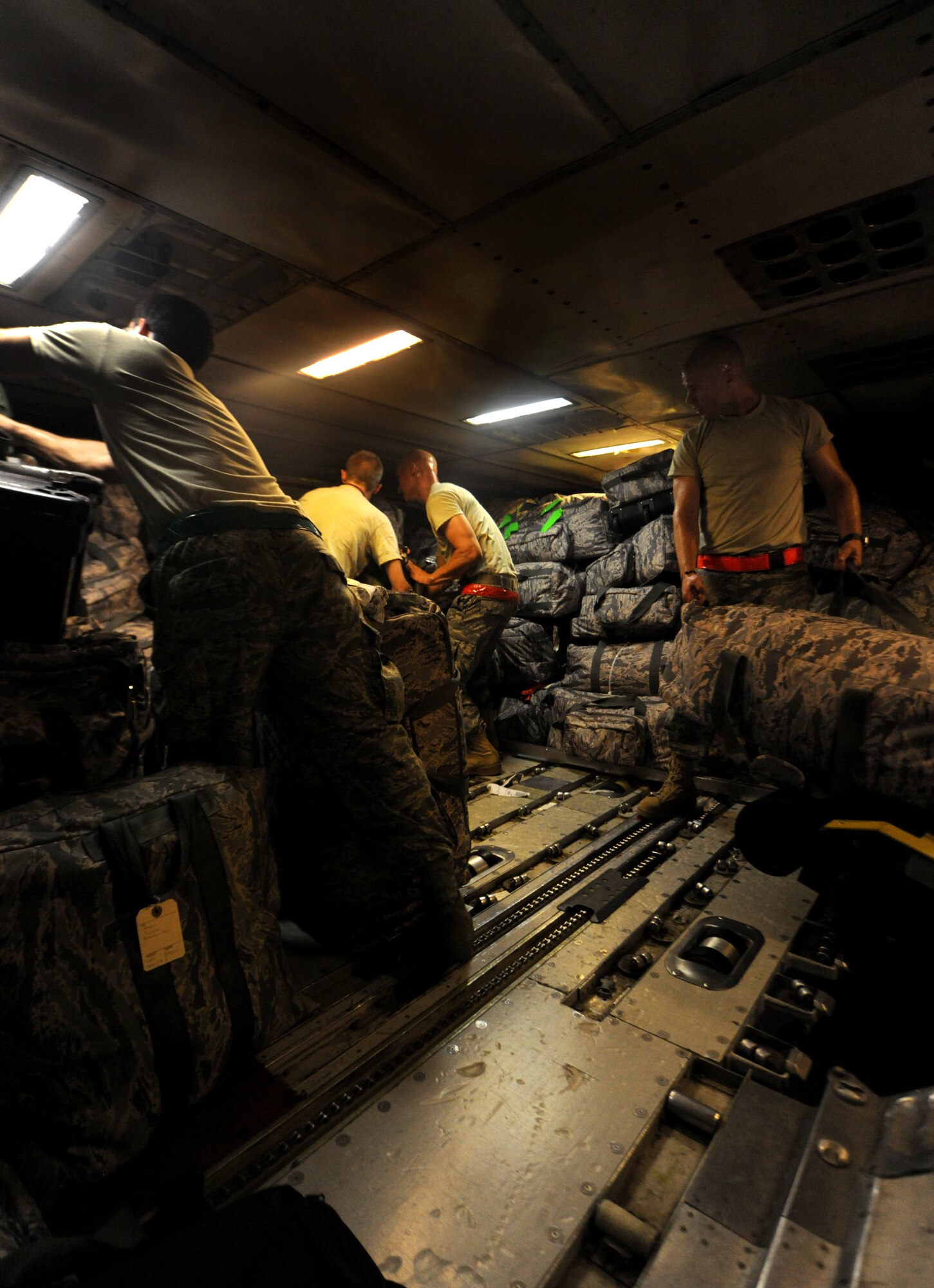 MOODY AIR FORCE BASE, Ga. -- Members from different squadrons around Moody load gear onto a commercial flight here. The members from the 23rd Aircraft Maintenance Unit loaded their own equipment before boarding the aircraft. (U.S. Air Force photo/Airman 1st Class Benjamin Wiseman)



