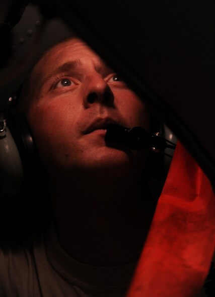 MOODY AIR FORCE BASE, Ga. -- Staff Sgt. Jamie Case, 74th Aircraft Maintenance Unit dedicated crew chief, checks the panels under an A-10C Thunderbolt II during preflight check here. It is necessary for the crew chief to be tedious in their inspection to ensure that the aircraft can take-off and land safely. (U.S. Air Force photo/Airman 1st Class Benjamin Wiseman)

