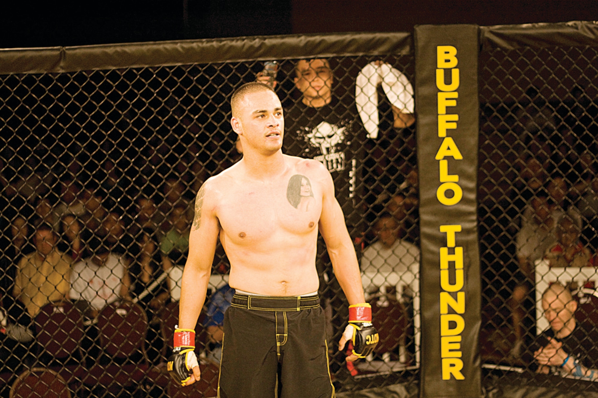 Tech Sgt. David Perez is a mixed martial artist who won two "King of the Cage" bouts June 4, 2010, at Buffalo Thunder Casino Resort in Santa Fe, N.M. (Courtesy photo/Ryan Garcia)