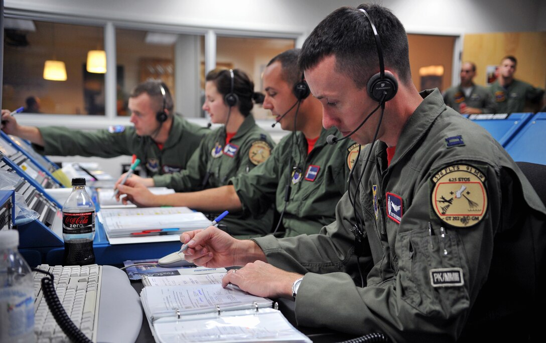 Launch team members from the 576th Flight Test Squadron conduct pre-flight operations for a Minuteman III intercontinental ballistic missile launch Sept. 17, 2010, at Vandenberg Air Force Base, Calif. The launch tested the missiles operational effectiveness, readiness and accuracy. (U.S. Air Force photo/Senior Airman Andrew Lee)

 