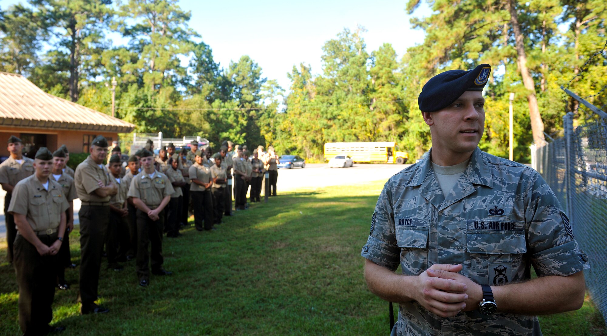 MOODY AIR FORCE BASE, Ga. -- Tech. Sgt. Joseph Boyce, 23rd Security Forces Squadron, NCO in-charge observes his Airmen and MWDs as they perform a demonstration for members of the Colquitt County High School Marine Corps Junior ROTC here Sept. 16. The high school students visited the base to get a firsthand look of what military life is all about. (U.S. Air Force photo/Airman 1st Class Joshua Green)



