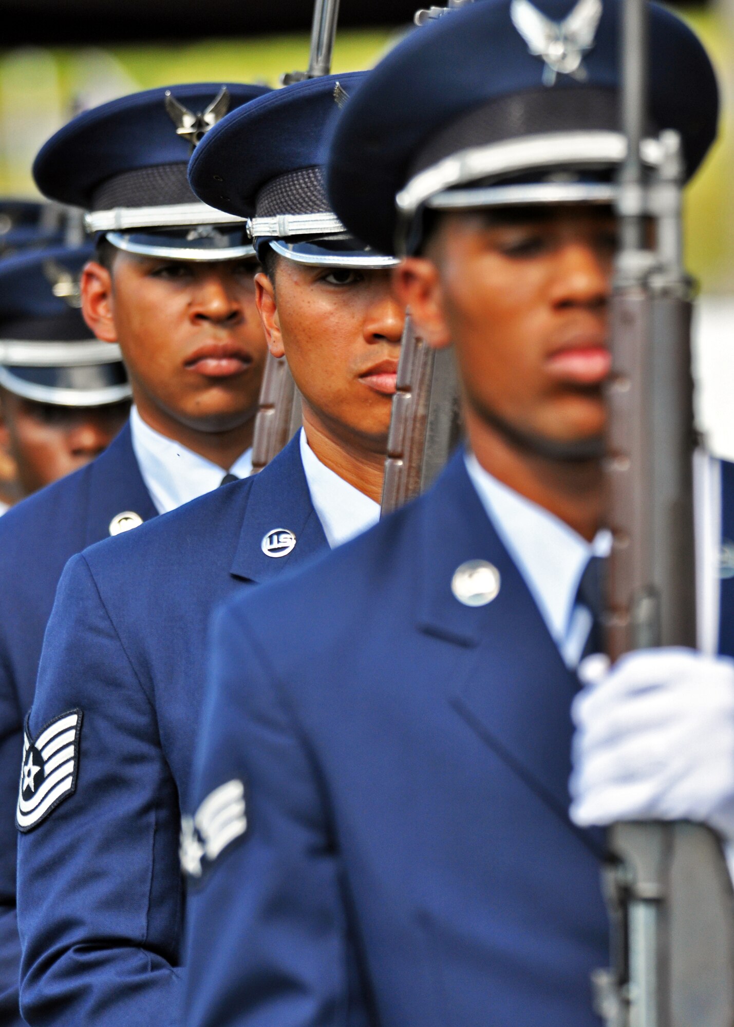 Members of the Eglin Honor Guard march off after rendering a 21-gun salute at the POW/MIA ceremony Sept. 17 at the Air Armament Museum.  The ceremony paid tribute to those military members who have yet to return home from defending America.  The event was hosted by the 96th Air Base Wing and featured guest speakers, honor guard procedures and a flyover by the 46th Test Wing.  (U.S. Air Force photo/Samuel King Jr.)