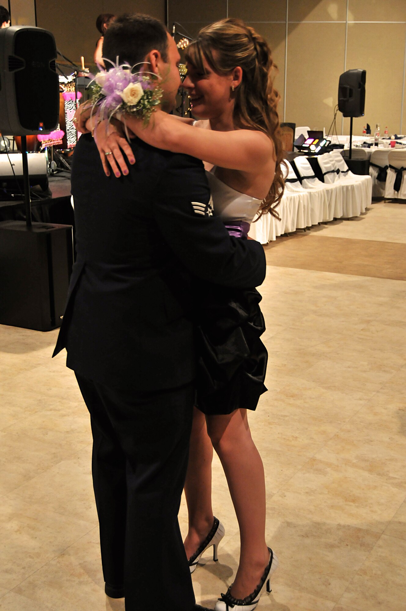 GOODFELLOW AIR FORCE BASE, Texas – Senior Airman Cristobal Ibarra, 17th Training Wing Judge Advocate, and wife Amanda Burns, dance to the tunes of the Divas during the 63rd Annual Goodfellow Air Force Ball, Sept. 17. The Divas are a local folk group consisting of six women. (U.S. Air Force photo/ Senior Airman Tong Duong)