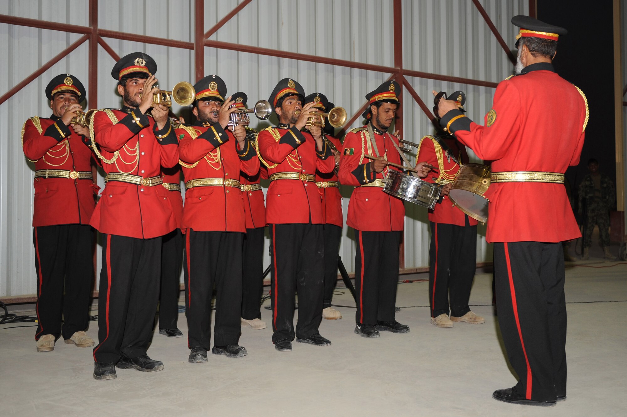 An Afghan ceremonial band plays music for the U.S. Air Force’s 63rd birthday celebration, Sept. 19, 2010, at Kandahar Airfield, Afghanistan.  The Kandahar Air Wing hosted Airmen from the 451st Air Expeditionary Wing and the 738th Air Expeditionary Advisory Group for a traditional meal and social event to commemorate the establishment of the U.S. Air Force. (U.S. Air Force photo by Tech. Sgt. Chad Chisholm/Released)
