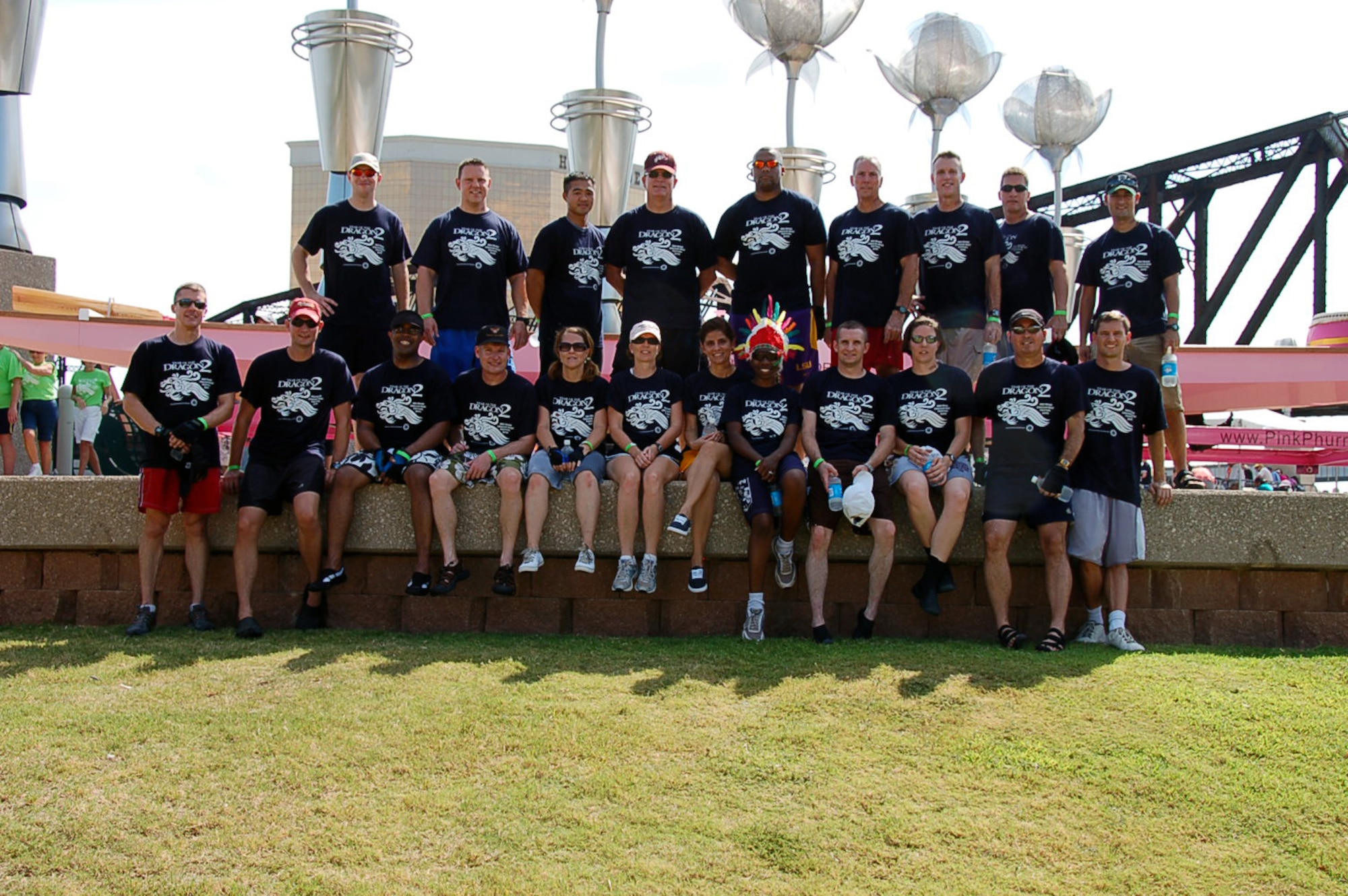 SHREVEPORT, La. – Members of the Eighth Air Force dragon boat team pose for a picture after their first race of the day Sept. 11. The team competed against 26 other teams during the 2nd Annual Red River Dragon Boat Festival held at the River View Park in Shreveport, La. The races feature 41-foot-long dragon boats that hold 21 team members, Eighth Air Force finished fourth in the race. (U.S. Air Force photo by Staff Sgt. Brian Stives)