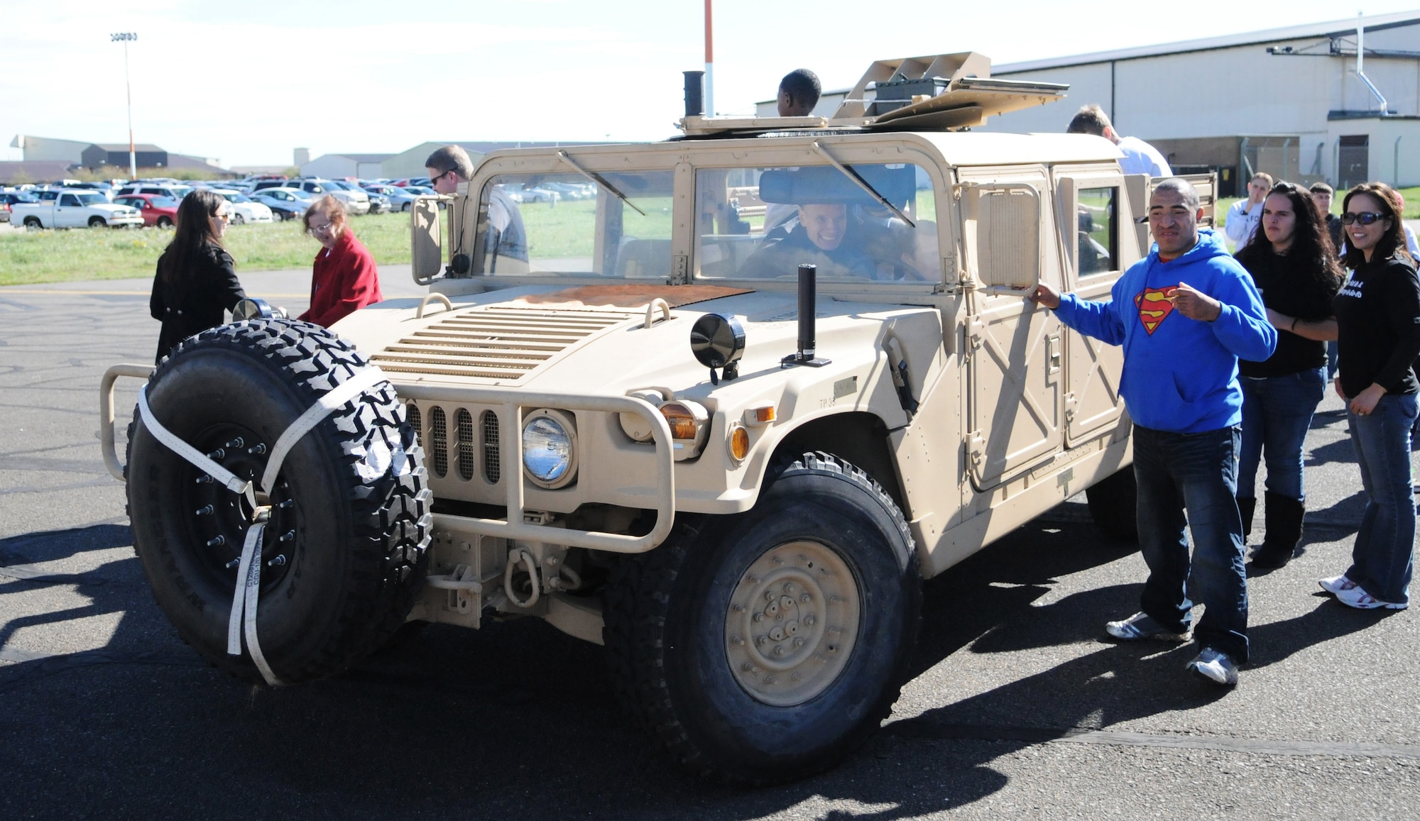 RAF MILDENHALL, England -- In addition to sporting events at Joan Mann Special Sports Day, participants had access to static displays of a Humvee, base fire truck and special operations aircraft near Hangar 711 Sept. 18. About 900 volunteers ran the event for more than 350 caregivers and athletes. (U.S. Air Force photo/Staff Sgt. Thomas Trower) 