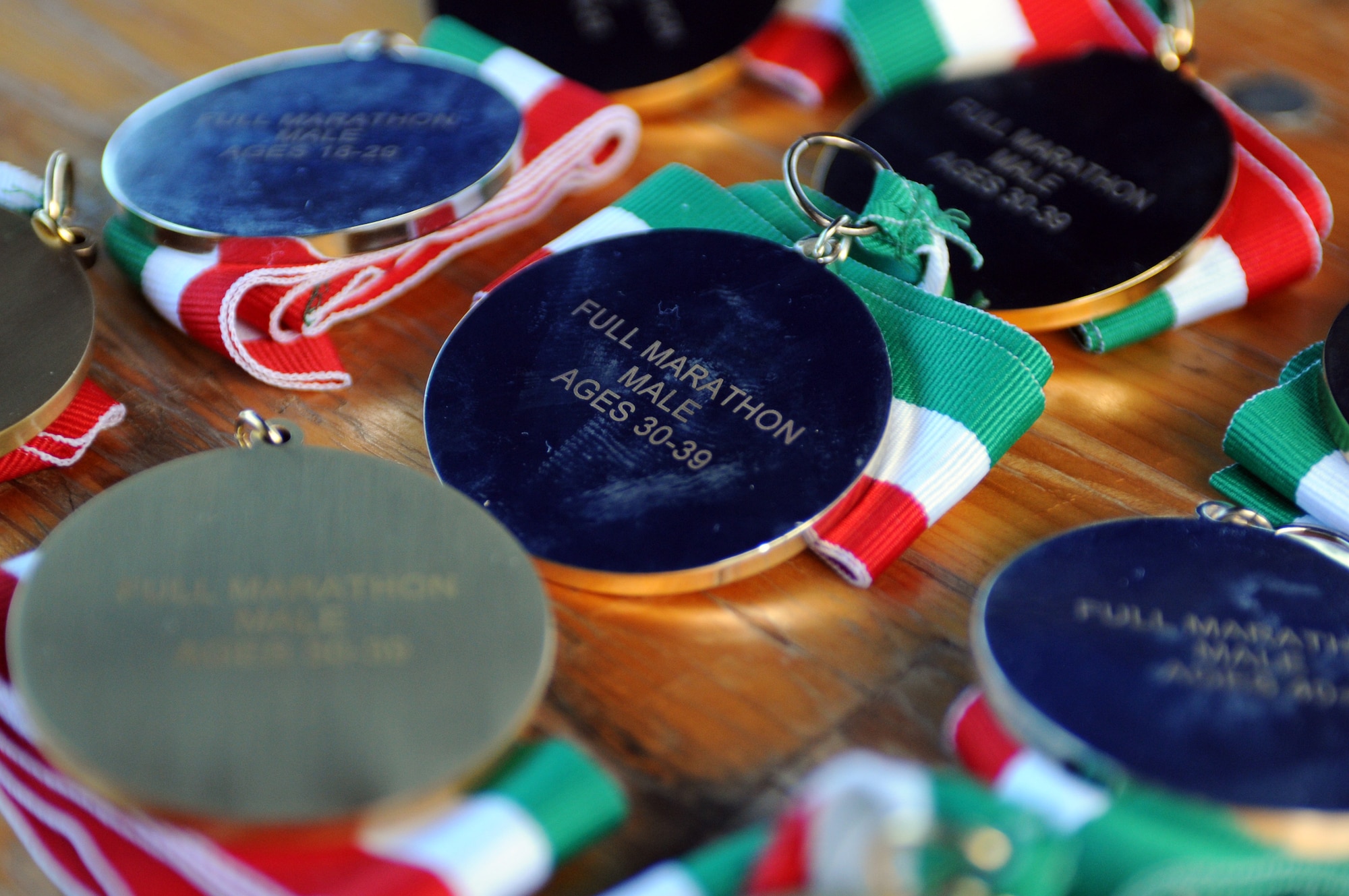 Medals await runners who finish the various events of the fourth annual Aviano Marathon Sept. 19. Races include 5K and 10K runs, a mile-long kids' run, half and full marathons. (U.S. Air Force photo/Staff Sgt. Julius Delos Reyes)