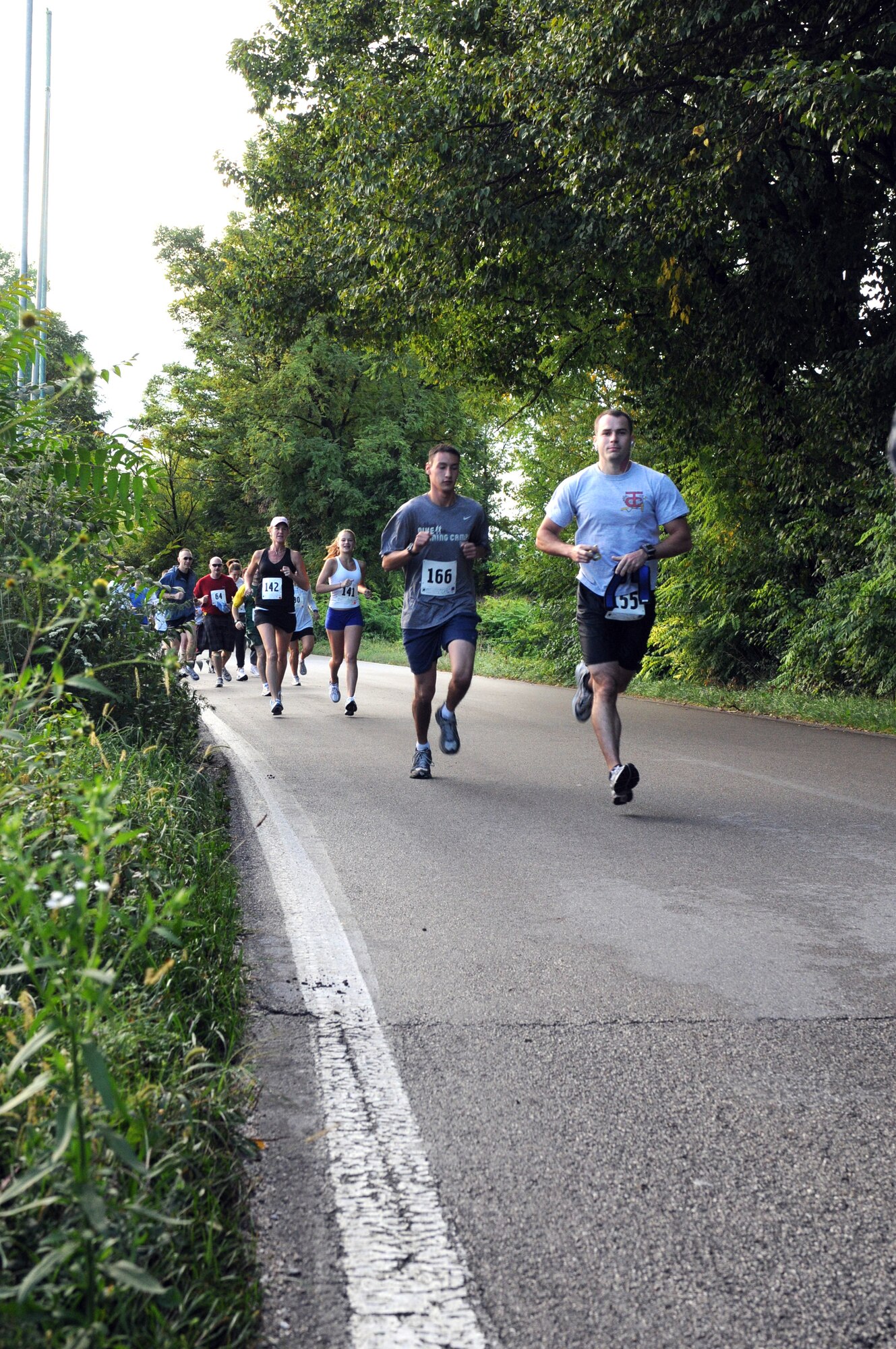 Participants run the 10K course of the fourth annual Aviano Marathon Sept. 19. Approximately 150 runners participated in various events including full and half marathons, 5K and a mile-long kids' run. (U.S. Air Force photo/Staff Sgt. Julius Delos Reyes)