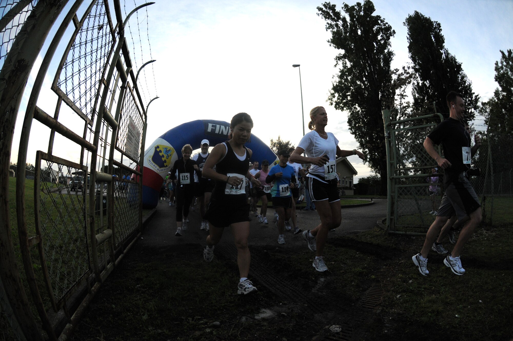 Runners start the half marathon event at Area D during the fourth annual Aviano Marathon Sept. 19. Other race events include full marathon, 5K and 10K runs and a kids' mile run. (U.S. Air Force photo/Staff Sgt. Julius Delos Reyes)