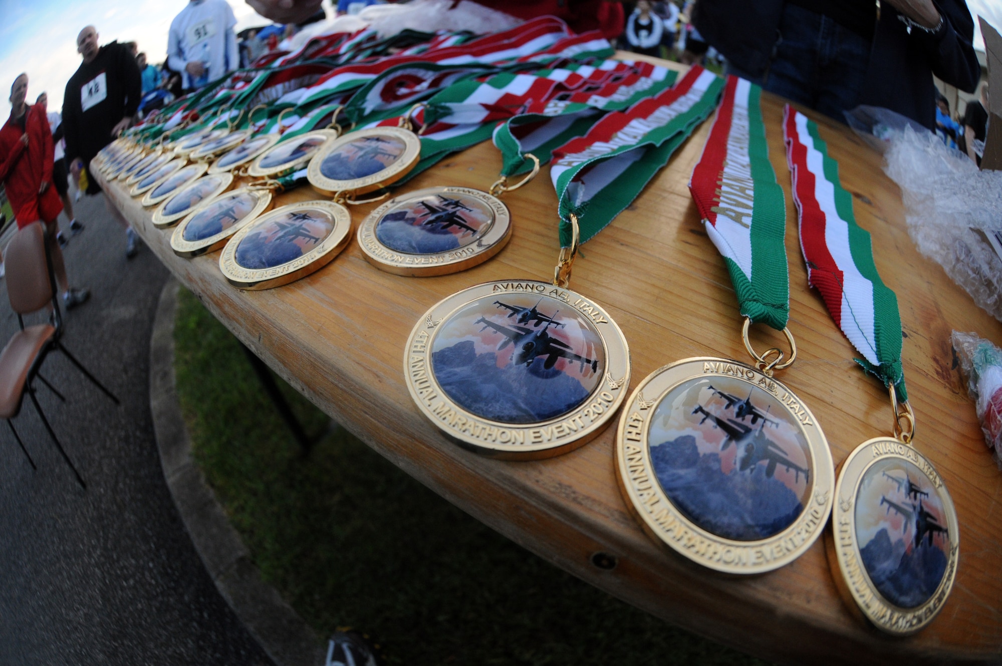 Medals await runners who finish the various events of the fourth annual Aviano Marathon Sept. 19. Races include 5K and 10K runs, a mile-long kids' run, half and full marathons. (U.S. Air Force photo/Staff Sgt. Julius Delos Reyes)