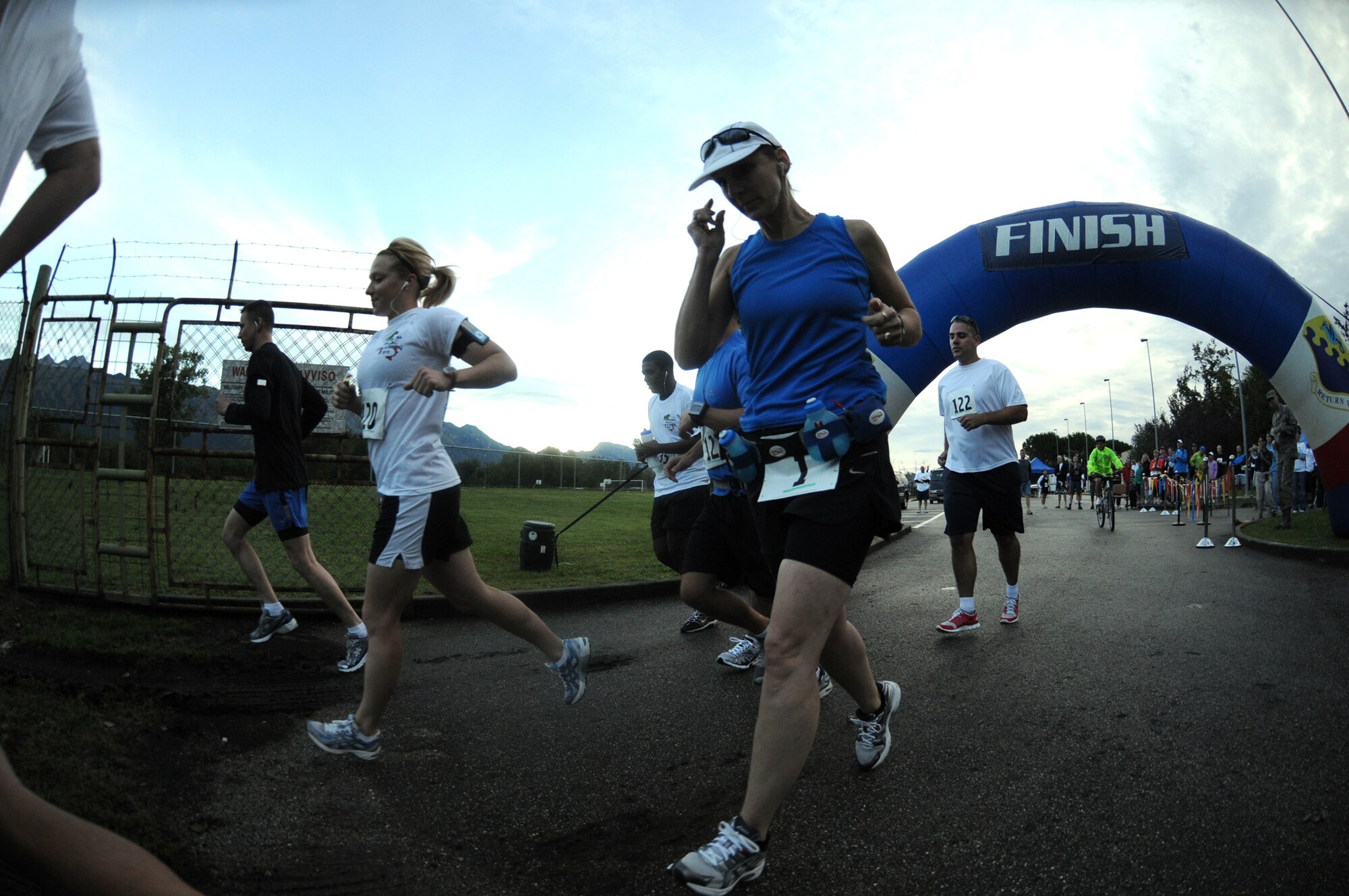 Runners start the full marathon event at Area D during the fourth annual Aviano Marathon Sept. 19. Other race events include full marathon, 5K and 10K runs and a kids' mile run. (U.S. Air Force photo/Staff Sgt. Julius Delos Reyes)