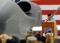 ANDERSEN AIR FORCE BASE, Guam - Brig. Gen. John Doucette, 36th Wing commander addresses the audience during the Global Hawk arrival here Sept. 20. The Global Hawk's mission is to provide a broad spectrum of intelligence, surveillence and reconnaissance collection capability to support joint combatant forces in worldwide peacetime, contingency and wartime operations. Global Hawk is operated by the 12th Reconnaissance Squadron, Beale Air Force Base, Calif. (U.S. Air Force photo by Senior Airman Nichelle Anderson)