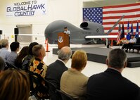 ANDERSEN AIR FORCE BASE, Guam - Brig. Gen. John Doucette, 36th Wing commander addresses the audience during the Global Hawk arrival here Sept. 20, 2010. The Global Hawk's mission is to provide a broad spectrum of ISR collection capability to support joint combatant forces in worldwide peacetime, contingency and wartime operations. Hawk is operated by the 12th Reconnaissance Squadron, Beale Air Force Base, Calif. (U.S. Air Force photo by Senior Airman Nichelle Anderson)